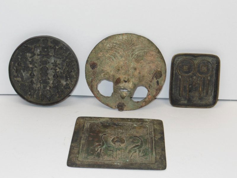 (2) Early Bronze Mirrors & (4) Pieces of Bronze.: Mirrors: 1 with herons & 1 with figures. Bronze Pieces: door knocker, tray, etc.,