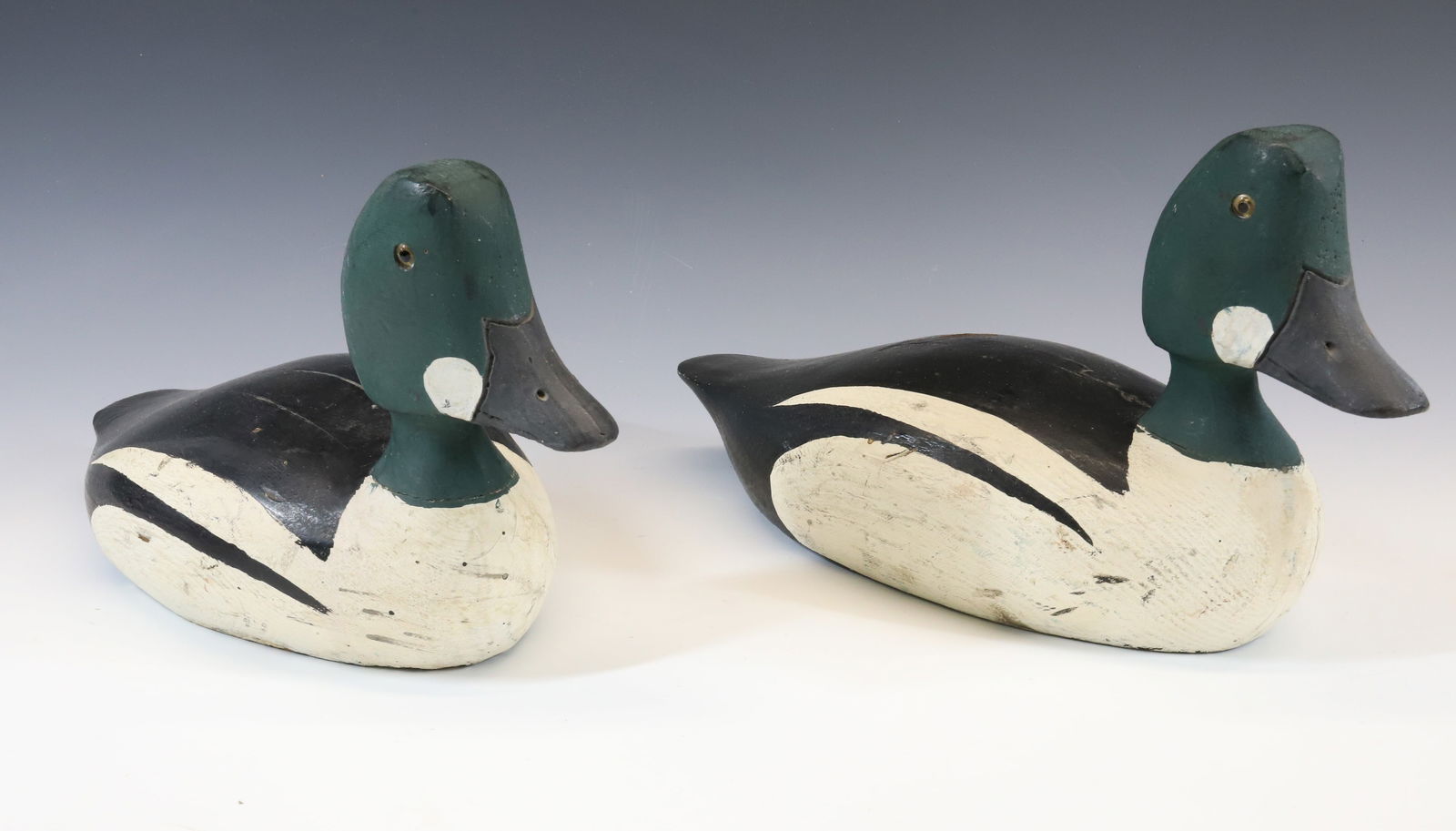 PAIR OF CARVED WOODEN DECOYS (1 of 4)