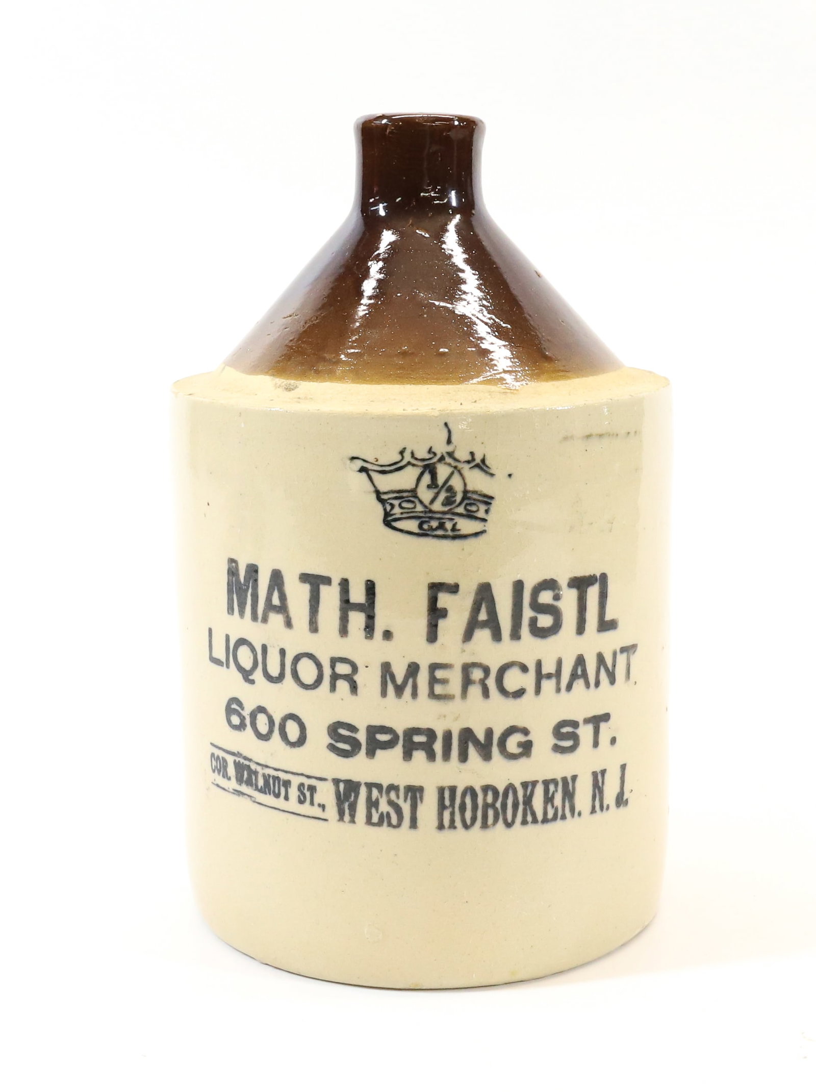 WEST HOBOKEN, NJ ADVERTISING JUG: MATH. FAISTL, LIQUOR MERCHANT, 600 SPRING ST. 9" H. PLEASE READ CAREFULLY - Terms for Purchasing and Shipping of Auction Items. Please read carefully before bidding. All payments for purchases will be