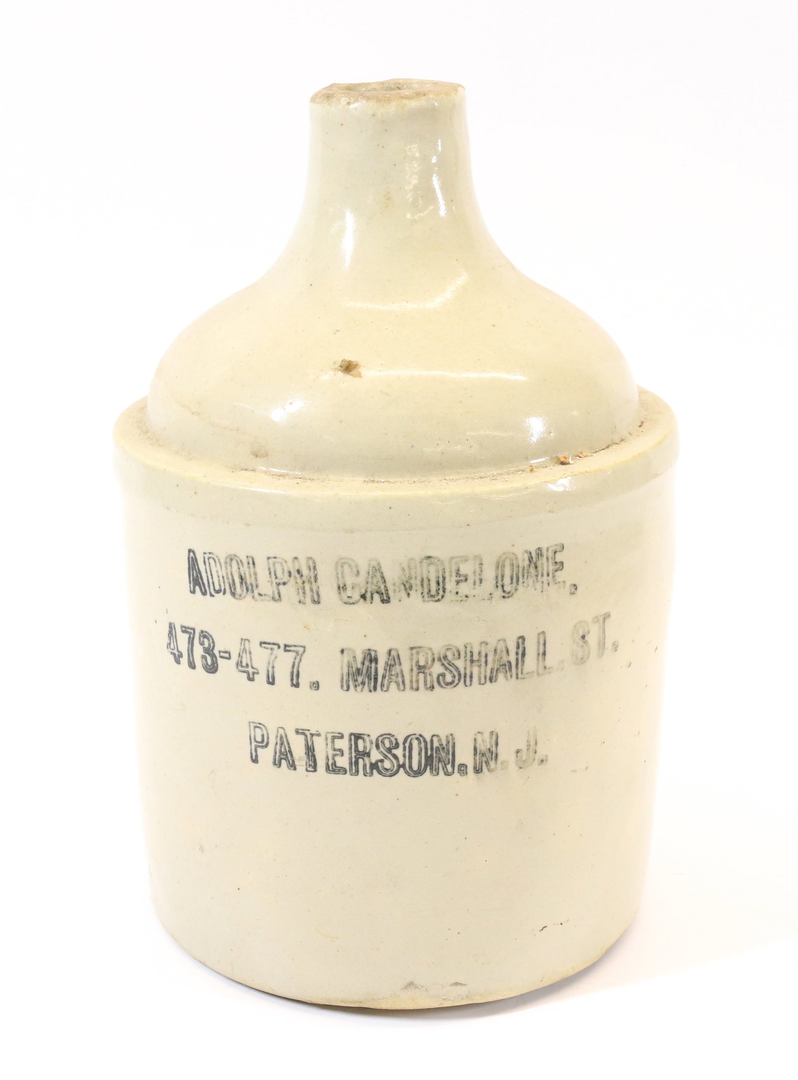 PATERSON, NJ ADVERTISING JUG: ADOLPH CANOELONE, 473-477, MARSHALL ST. 11 1/4" H. PLEASE READ CAREFULLY - Terms for Purchasing and Shipping of Auction Items. Please read carefully before bidding. All payments for purchases will be 
