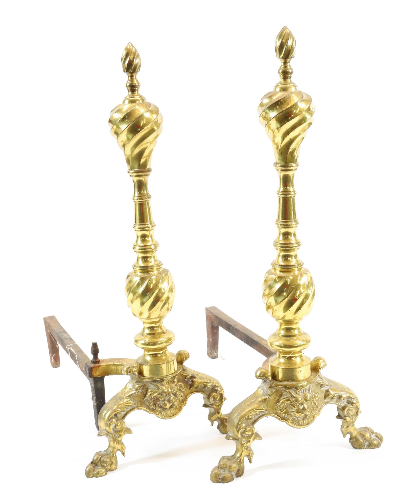 PAIR OF BRASS ANDIRONS: SWIRLED TOPS WITH FLAME FINIALS. PAW FEET WITH LION IN CENTER. 21" X 9" X 16". PLEASE READ CAREFULLY - Terms for Purchasing and Shipping of Auction Items. Please read carefully before bidding. All pay