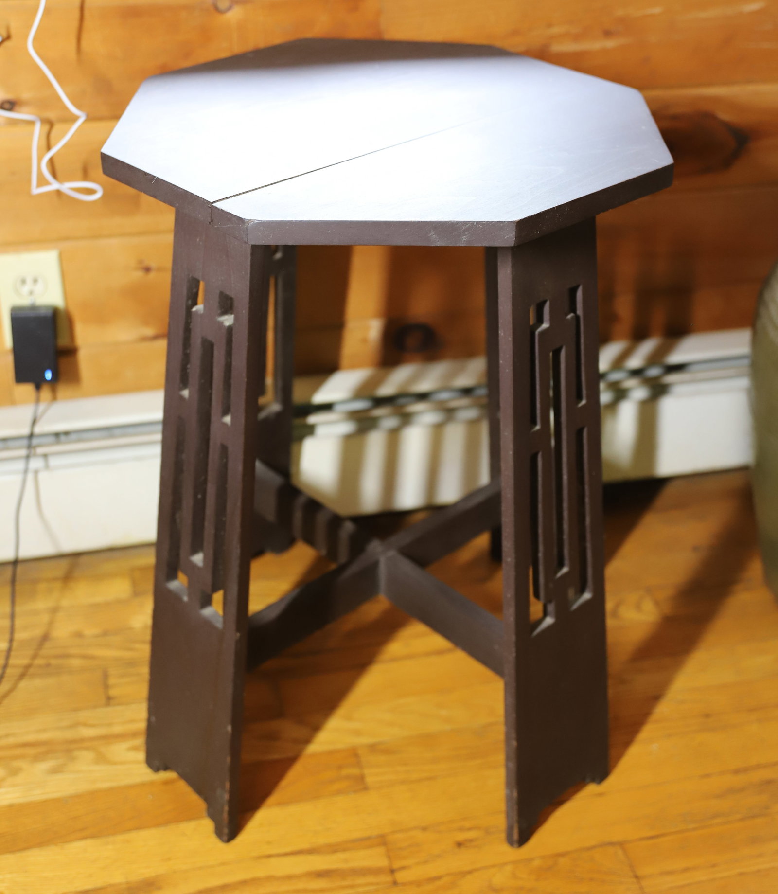 ARTS AND CRAFT-STYLE SIDE TABLE: OCTAGONAL TOP WITH CUT-OUT LEGS. 25" X 17 3/4". PLEASE READ CAREFULLY – THIS IS AN ONLINE ONLY AND ONSITE AUCTION. THE ADDRESS WILL BE GIVEN AFTER THE AUCTION HAS ENDED AND TO ALL SUCCESSFUL BID