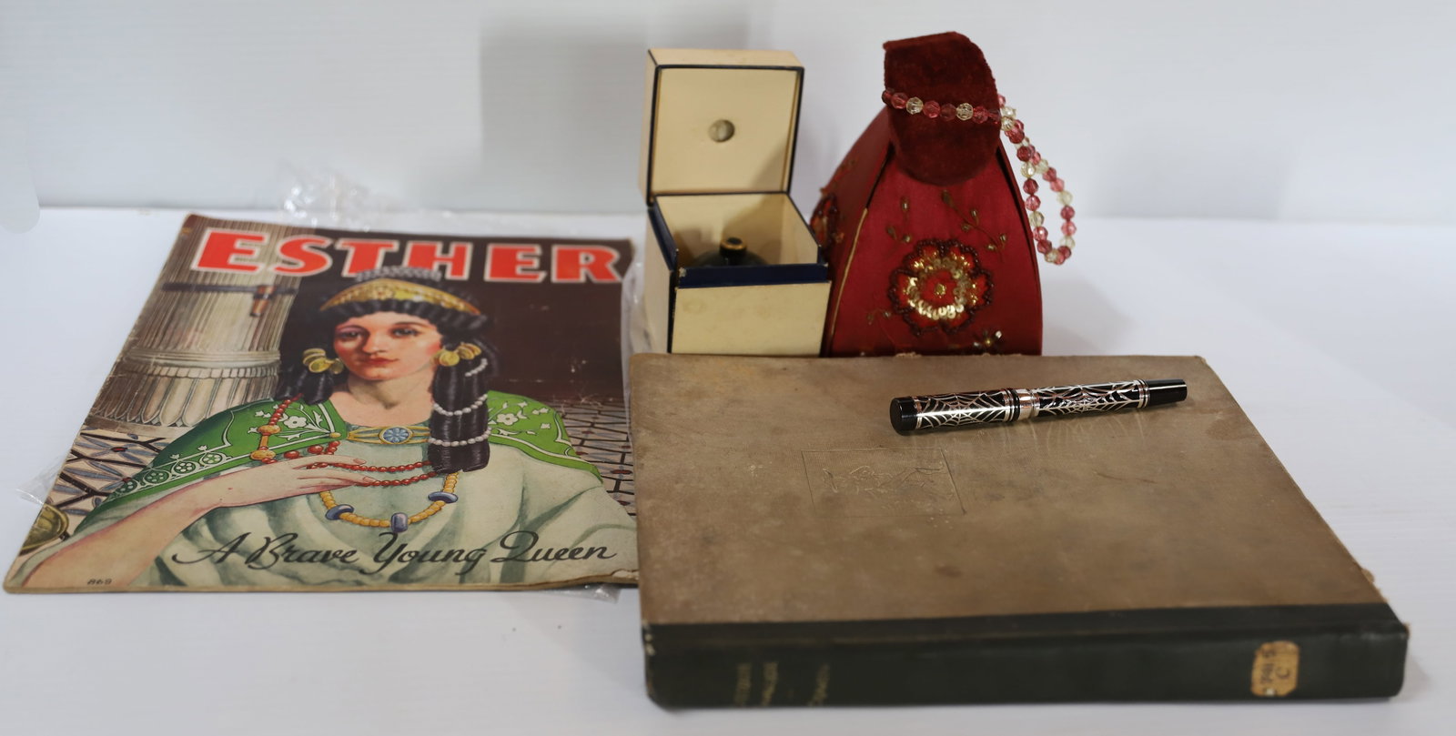 LABAN PEN, LANVIN PERFUME AND MORE: LABAN SPIDER WEB PEN (CAP DOES NOT STAY ON), LANVIN PERFUME IN ORIG. BOX (STOPPER BROKE OFF), VELVET PURSE, CARTOON CAVALCADE BOOK AND MORE. PLEASE READ CAREFULLY – THIS IS AN ONLINE ONLY AND ON