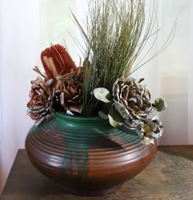 GREEN AND BROWN POTTERY VASE