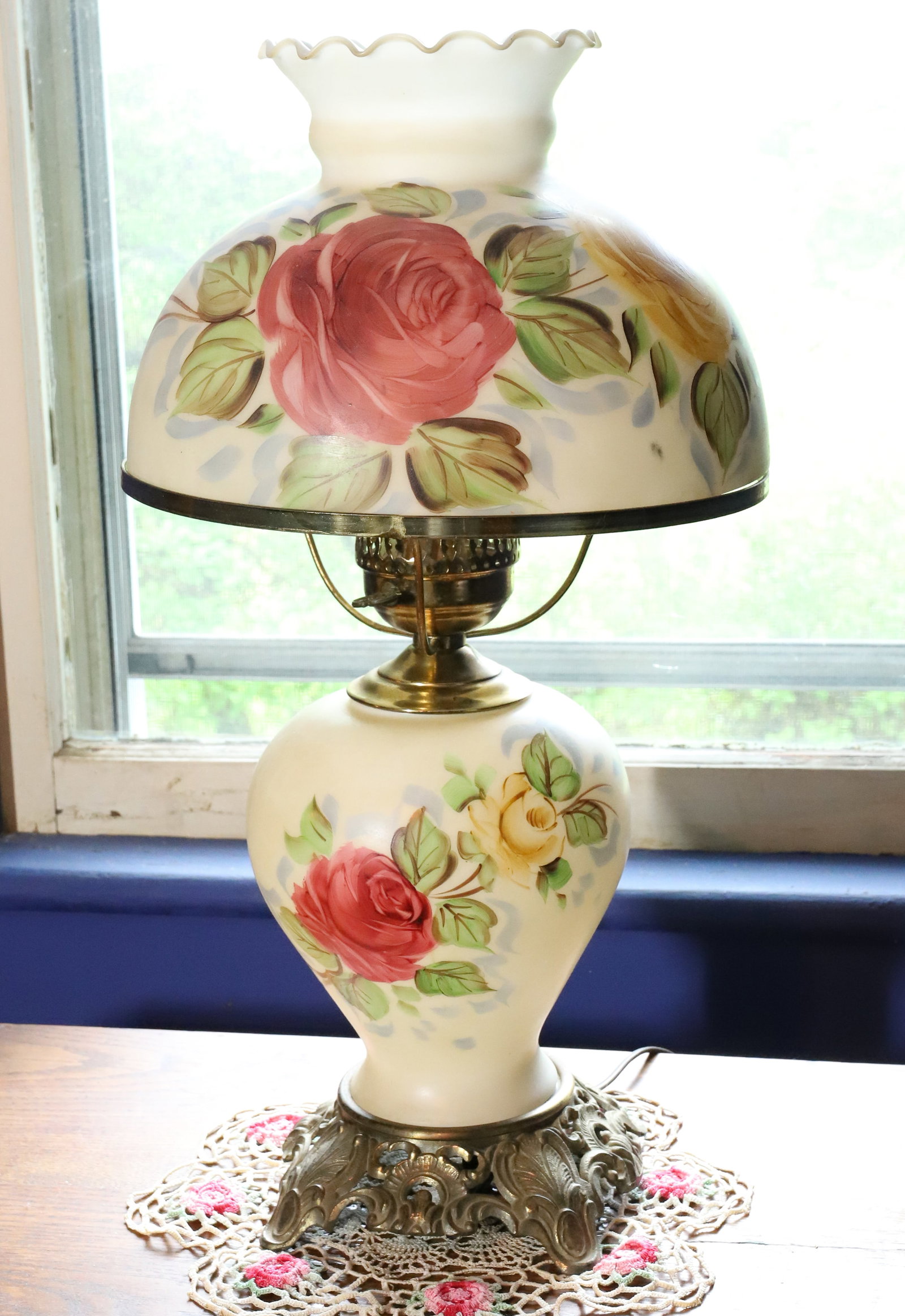HAND PAINTED VICTORIAN STYLE LAMP: FLORAL SHADE AND BODY, BRASS BASE - 22" X 12" PLEASE READ CAREFULLY – THIS IS AN ONLINE ONLY AND ONSITE AUCTION. THE ADDRESS WILL BE GIVEN AFTER THE AUCTION HAS ENDED AND TO ALL SUCCESSFUL BIDDE