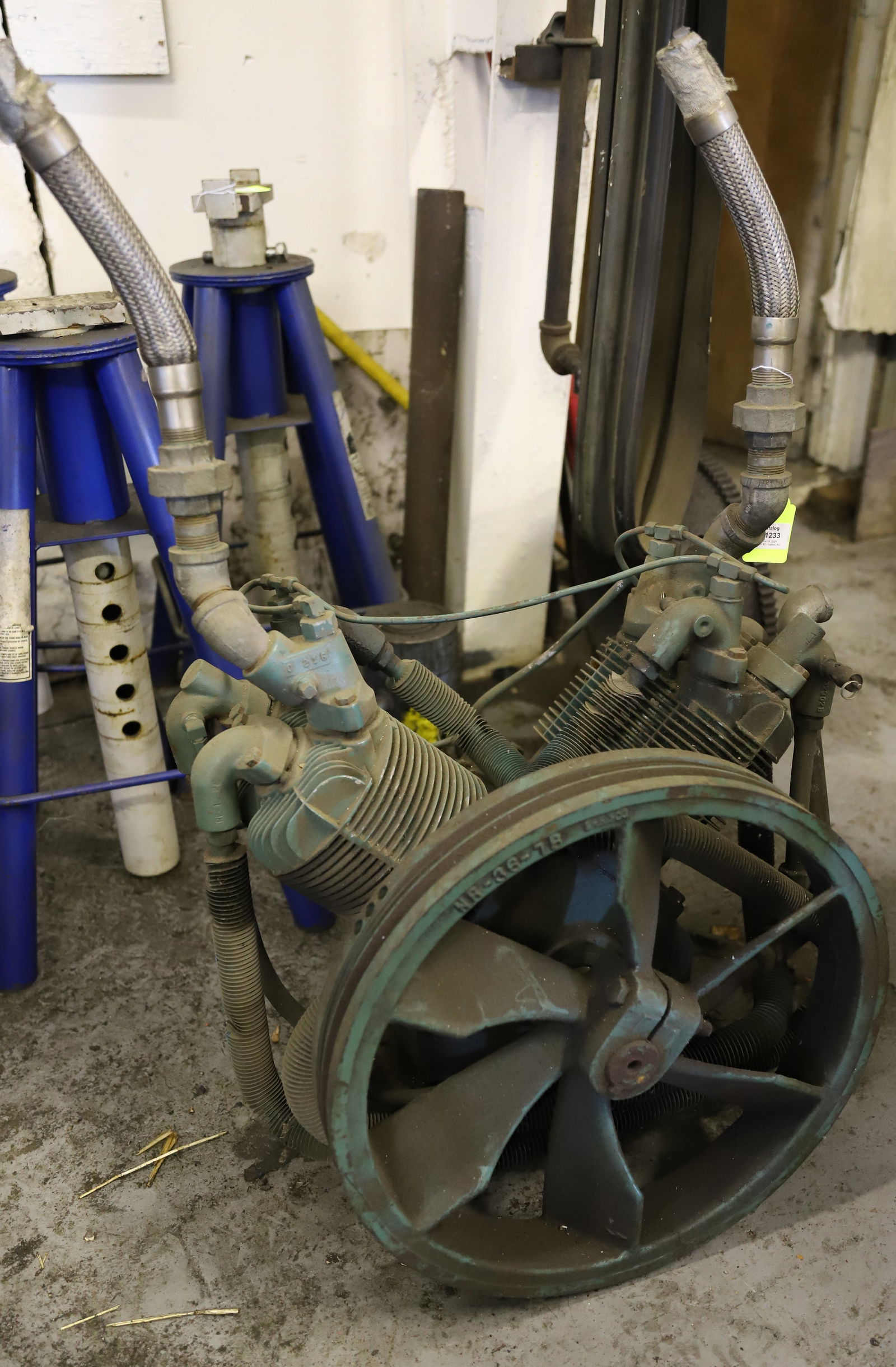 AIR COMPRESSOR MOTOR: 19" FLYWHEEL. PLEASE READ CAREFULLY - Terms for Purchasing and Shipping of Auction Items. Please read carefully before bidding. All payments for purchases will be made through LiveAuctioneers.com paym