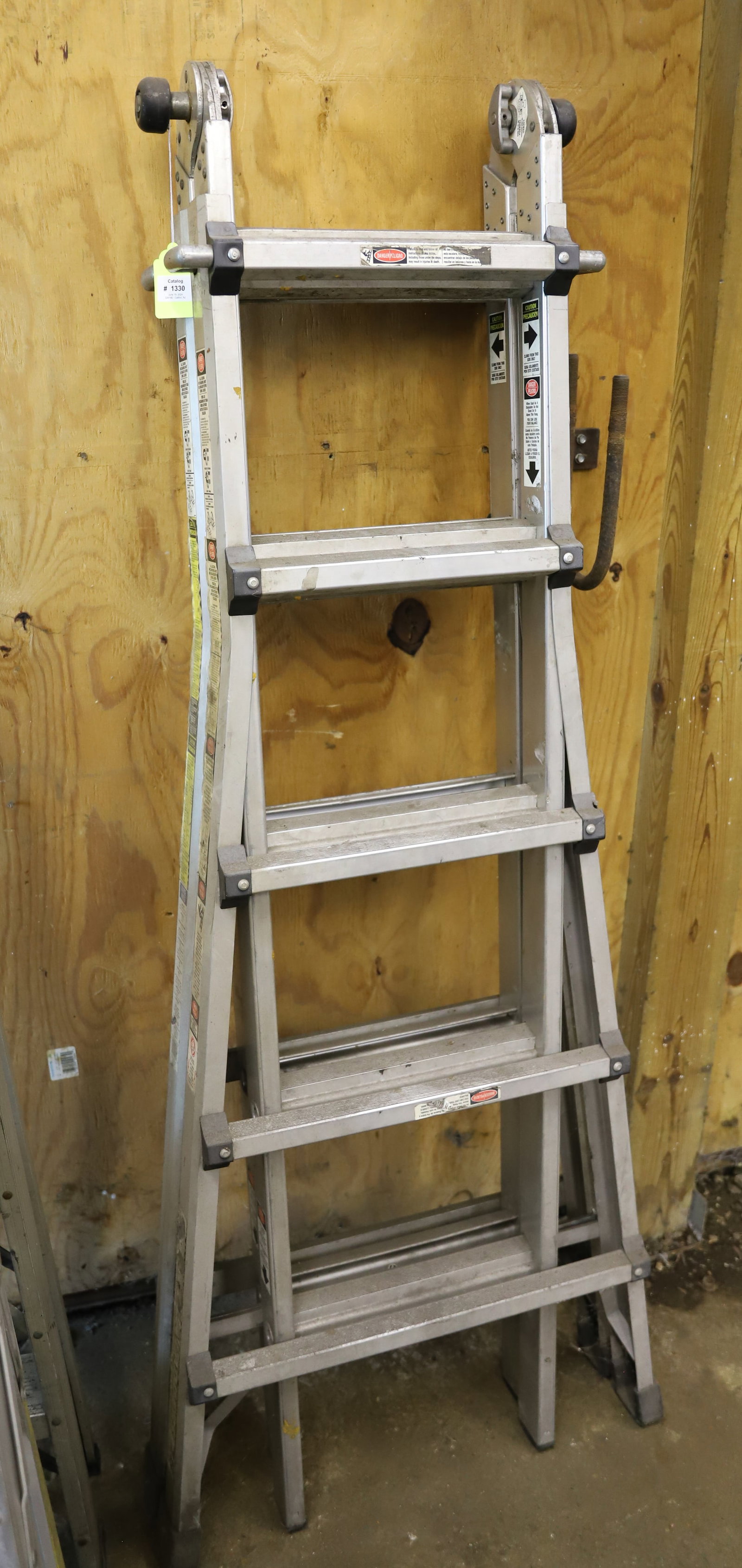 ALUMINUM GORILLA LADDER: 28 POSITIONS. PLEASE READ CAREFULLY - Terms for Purchasing and Shipping of Auction Items. Please read carefully before bidding. All payments for purchases will be made through LiveAuctioneers.com paym