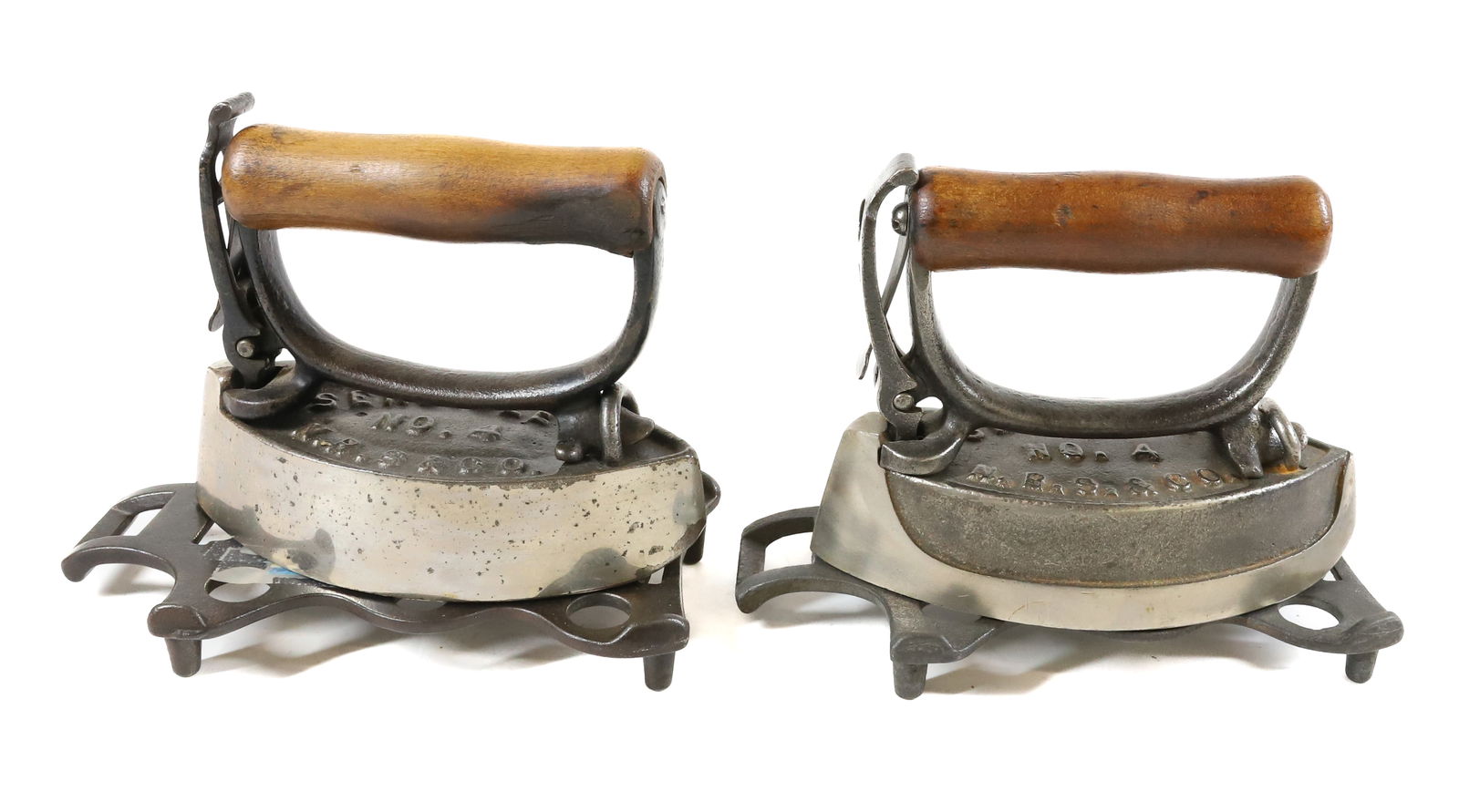 PAIR OF SMALL SIZE #4 SENSIBLE IRONS: SENSIBLE NO. 4 N.R.S. AND CO. WITH MATCHING TRIVETS. 5 1/4" L. PLEASE READ CAREFULLY - Terms for Purchasing and Shipping of Auction Items. Please read carefully before bidding. All payments for purcha