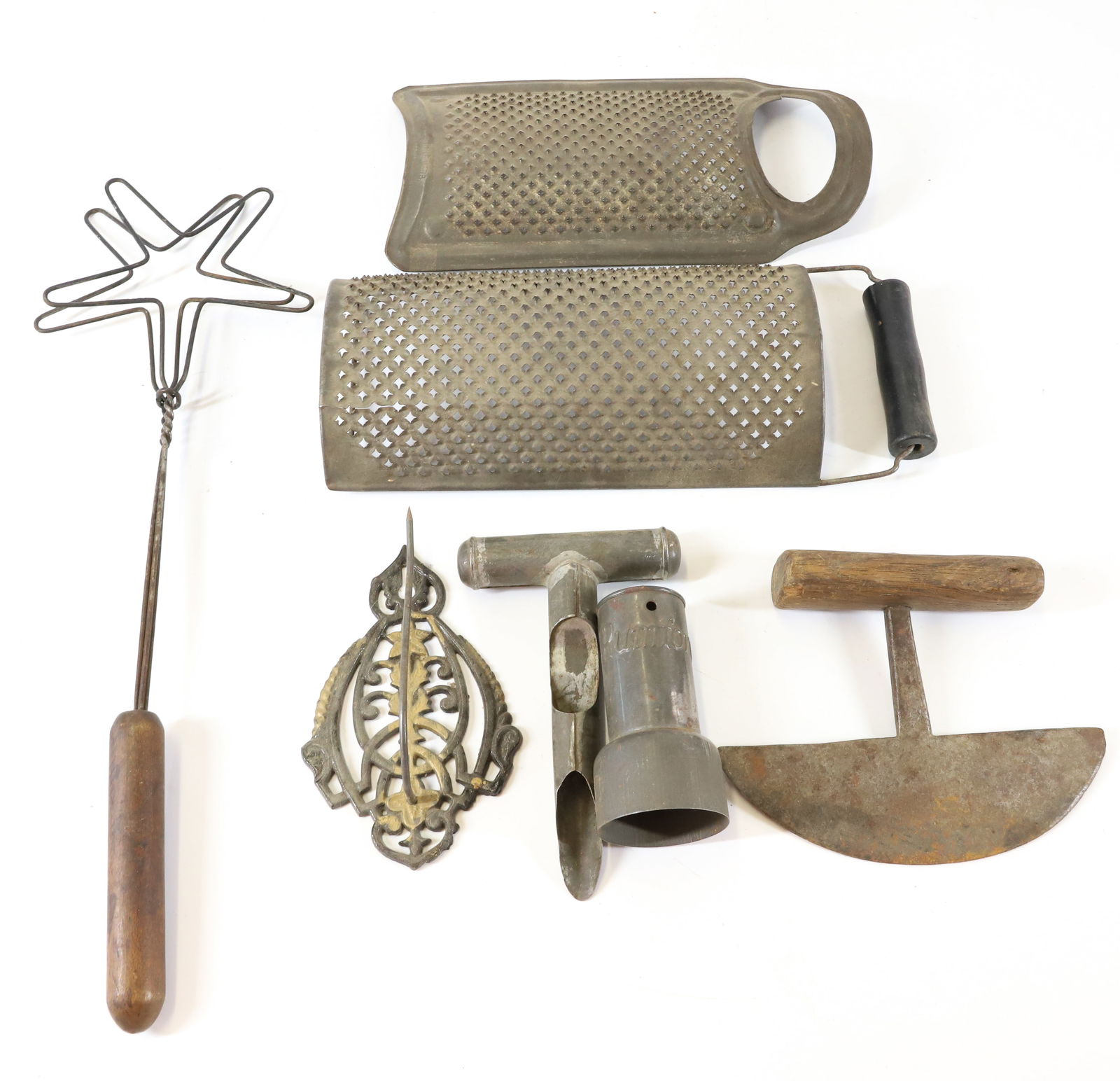LOT OF KITCHENWARE: TIN/IRON/WIRE. INCLUDING: TWO GRATERS, FOOD CHOPPER, ADVERTISING "RUMFORD" CUTTER, TOASTER AND MORE. TERMS: PLEASE READ CAREFULLY - Terms for Purchasing and Shipping of Auction Items. Please read care