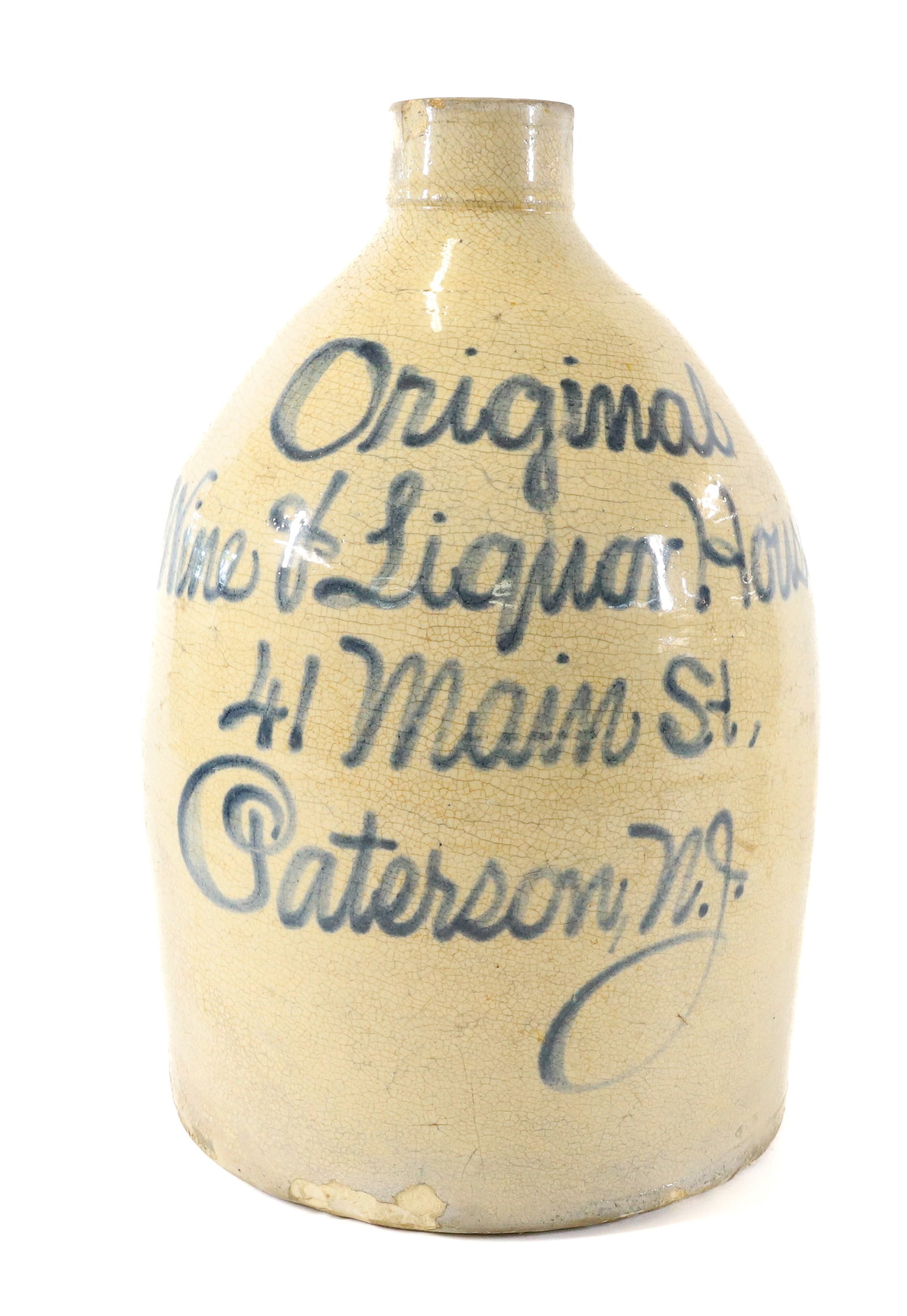 PATERSON, NJ SCRIPT ADVERTISING JUG: ONE GALLON STONEWARE JUG. "ORIGINAL WINE & LIQUOR HOUSE, 41 MAIN ST." 11 1/2" H. TERMS: PLEASE READ CAREFULLY - Terms for Purchasing and Shipping of Auction Items. Please read carefully before bidding