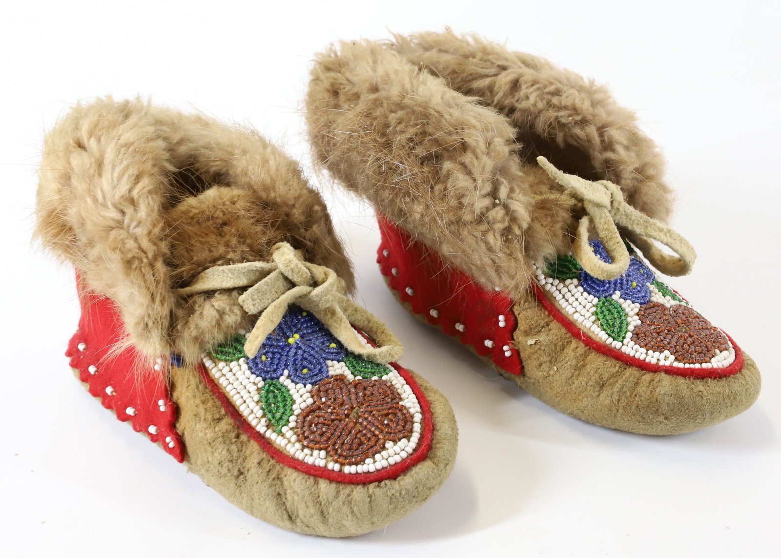 NATIVE AMERICAN BEADED MOCCASINS: ATTR. CREE. CHILDREN'S MOCCASINS WITH FLORAL BEADWORK. 6 3/4" L. TERMS: PLEASE READ CAREFULLY - Terms for Purchasing and Shipping of Auction Items. Please read carefully before bidding. All payments f