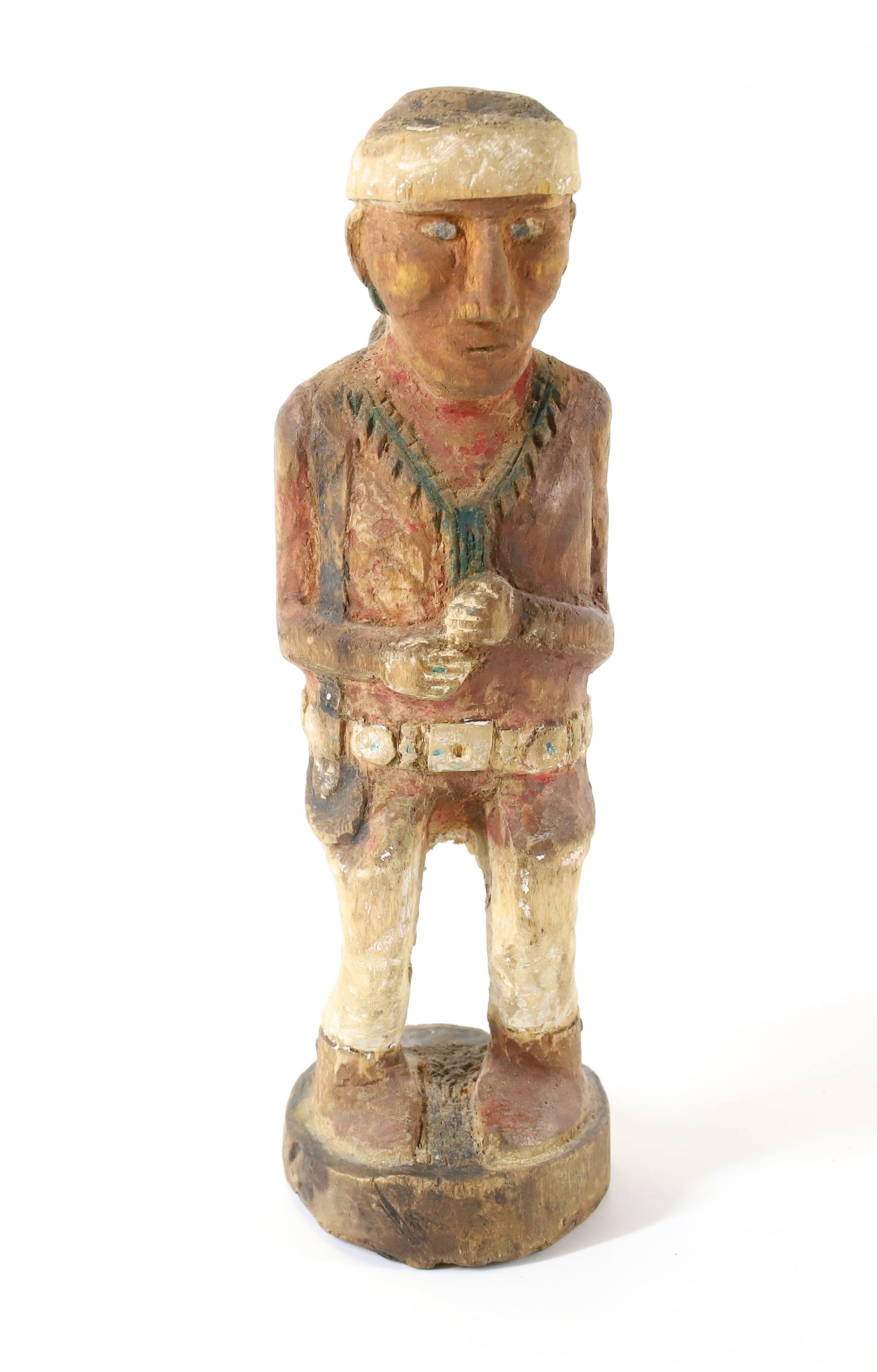 ANDY TSINAJINNIE (NAVAJO) CARVED NATIVE AMERICAN FIGURE: CARVED AND PAINTED FIGURE. SGND. ON BOTTOM. 6 1/2" H. TERMS: PLEASE READ CAREFULLY - Terms for Purchasing and Shipping of Auction Items. Please read carefully before bidding. All payments for purchase