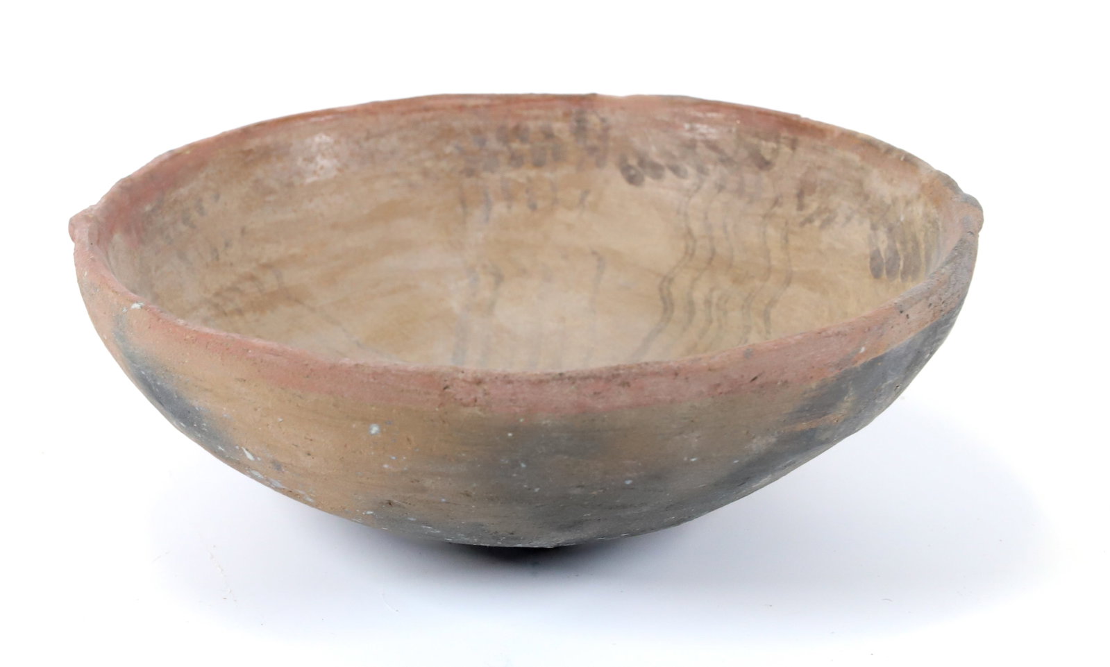 SOUTHWESTERN NATIVE AMERICAN BOWL: ATTR. HOHOKUM. INTERIOR WAVY LINE DESIGN. SMALL HAND HOLDS ON OUTSIDE. 2 1/4" X 5 3/4". TERMS: PLEASE READ CAREFULLY - Terms for Purchasing and Shipping of Auction Items. Please read carefully before 