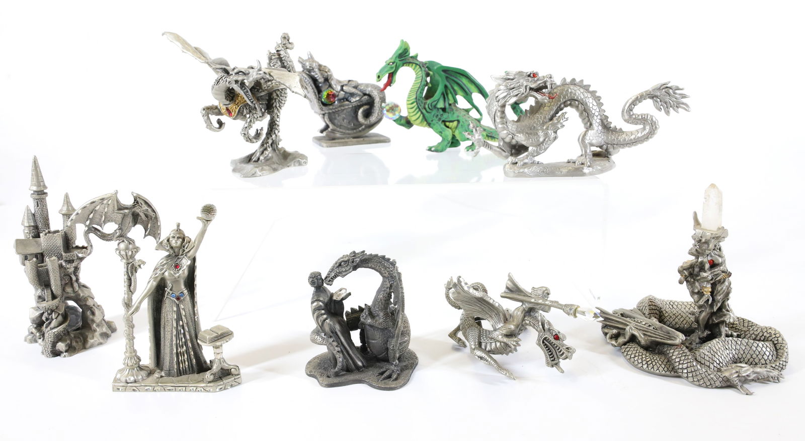 LOT OF (9) PEWTER DRAGON FIGURINES: VARIOUS SIZES AND MAKERS INCLUDING: HUDSON, MASTERWORKS AND MORE. LARGEST 4" X 4". TERMS: PLEASE READ CAREFULLY - Terms for Purchasing and Shipping of Auction Items. Please read carefully before biddi