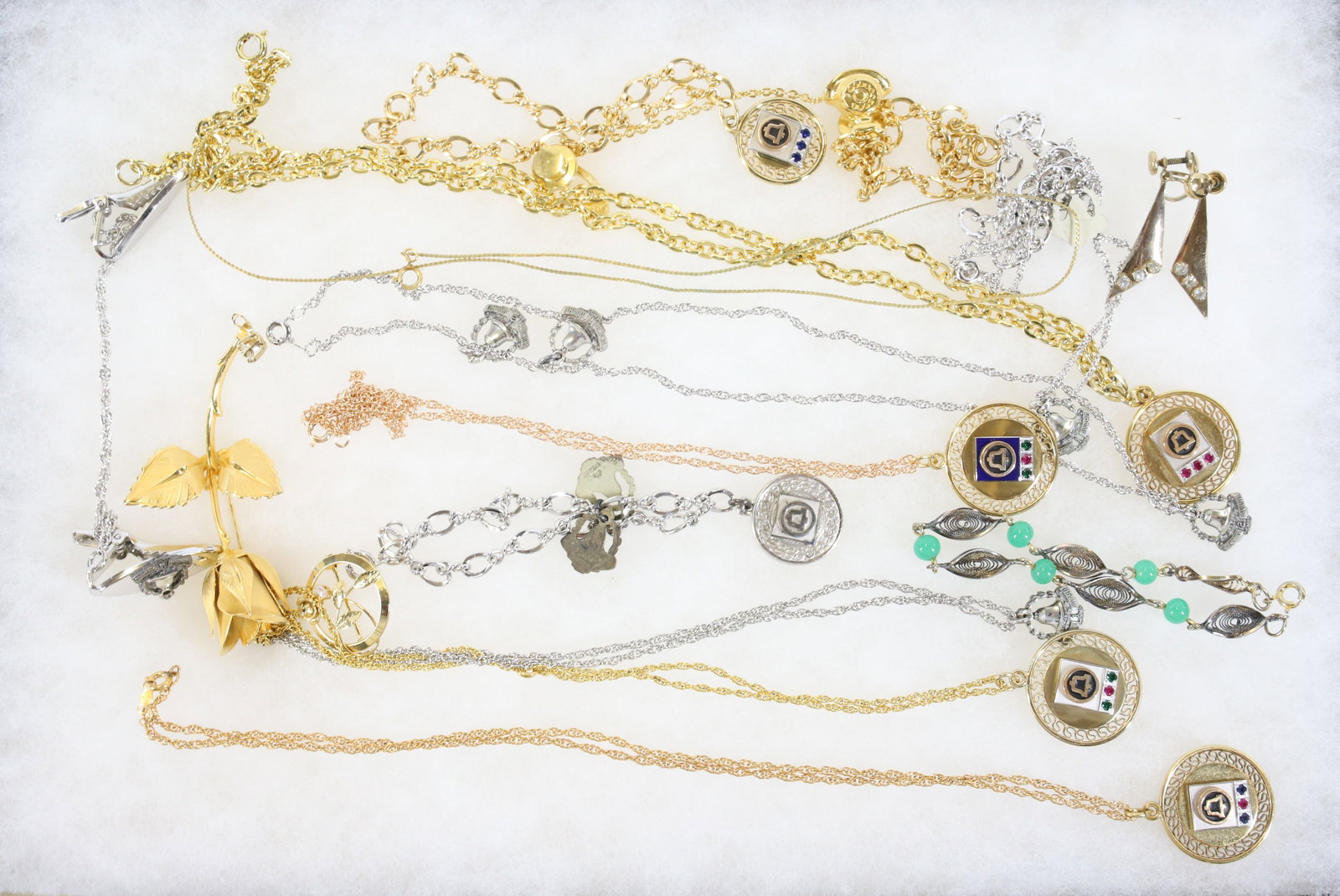 LOT OF COSTUME JEWELRY: INCLUDING: NECKLACES, PINS AND BRACELETS. TERMS: PLEASE READ CAREFULLY - Terms for Purchasing and Shipping of Auction Items. Please read carefully before bidding. All payments for purchases will be ma