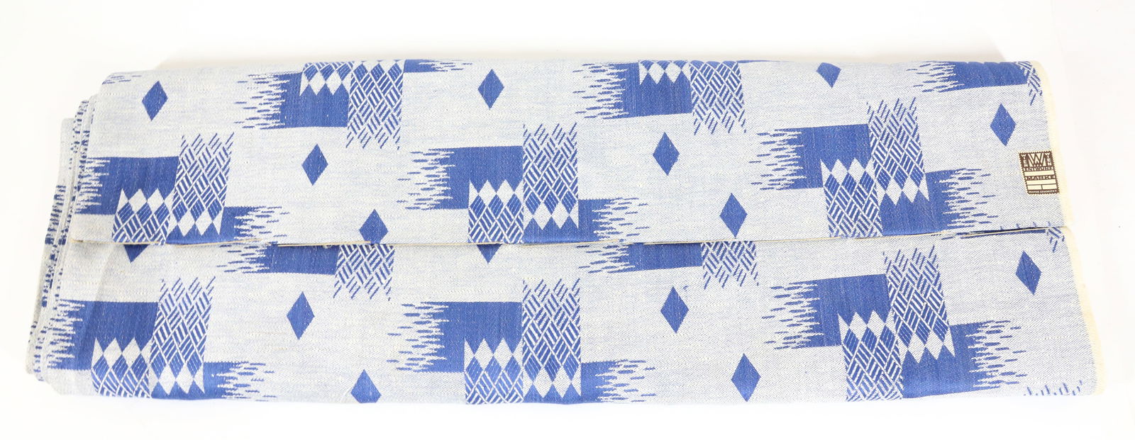 ANTIQUE WIENER WERKSTATTE BOLT OF FABRIC: ANTIQUE BOLT OF BLUE AND GRAY ART DECO PATTERN LABELED "WIEN ENTWURF MARKE, MUSTER GESCHUTZT". ORIGINAL LABEL. 24". UNOPENED. APPROXIMATELY 288" LENGTH. TERMS: PLEASE READ CAREFULLY - Terms for Purcha