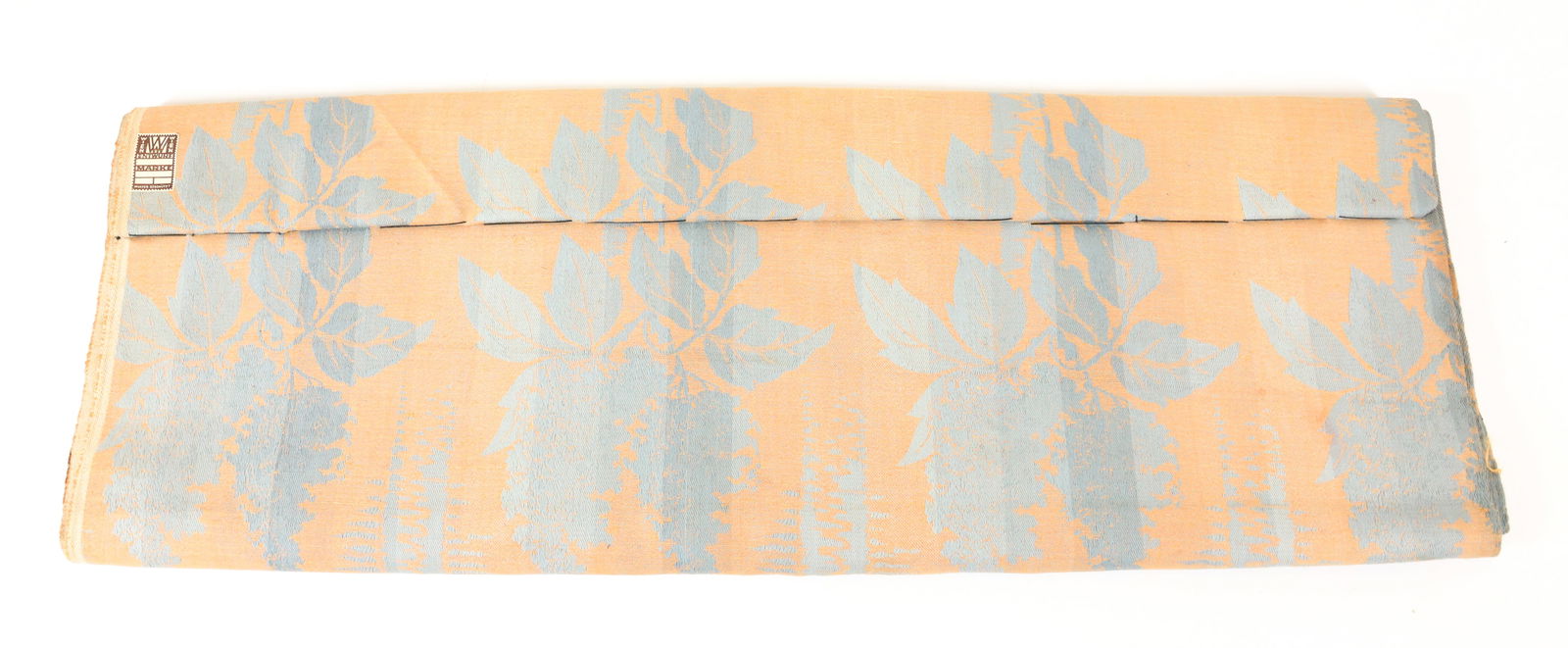 ANTIQUE WIENER WERKSTATTE BOLT OF FABRIC: ANTIQUE BOLT OF PALE ORANGE WITH BLUE FLORAL PATTERN LABELED "WIEN ENTWURE, MARKE, MUSTER GESCH?TZT". 24". UNUSED. APPROXIMATELY 176" LENGTH. TERMS: PLEASE READ CAREFULLY - Terms for Purchasing and Sh