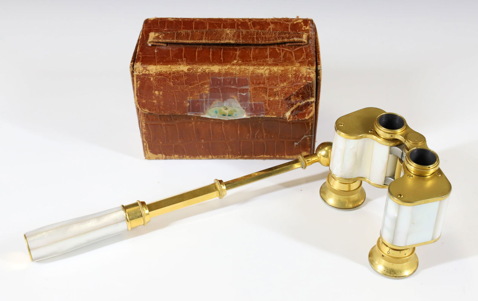 BRASS AND MOTHER-OF-PEARL OPERA GLASSES: MRKD. CARL ZEISS. FITTED CASE WITH INTERIOR MIRROR. TERMS: PLEASE READ CAREFULLY - Terms for Purchasing and Shipping of Auction Items. Please read carefully before bidding. All payments for purchases