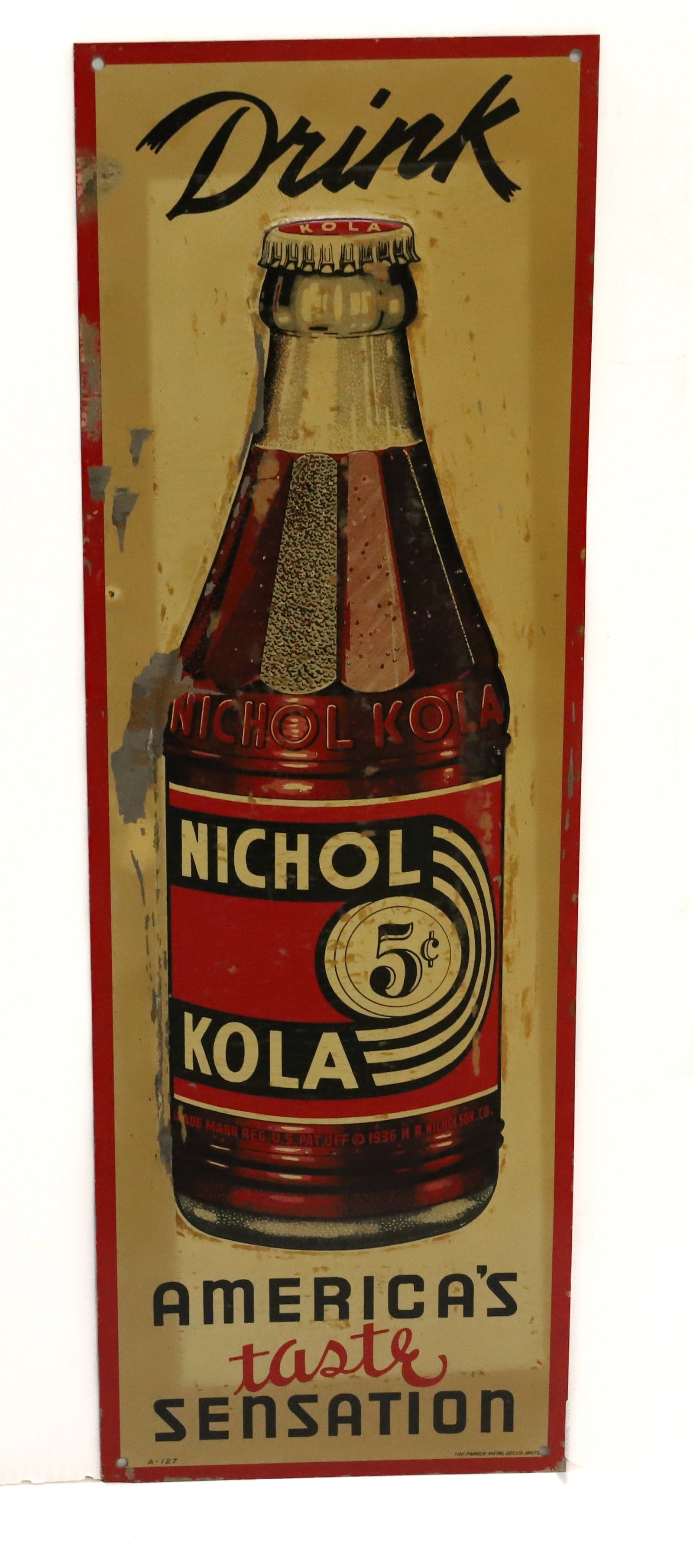 NICHOL KOLA TIN SIGN: PAINTED TIN "DRINK NICHOL KOLA, AMERICA'S TASTE SENSATION". 24" X 8". TERMS: PLEASE READ CAREFULLY - Terms for Purchasing and Shipping of Auction Items. Please read carefully before bidding. All payme