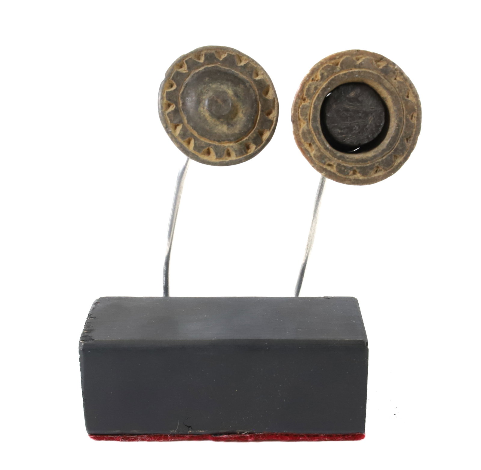 (2) COSTA RICAN CHOCOLATE WARE FLARES: PLUG EARRINGS FOUND TOGETHER IN BOLSON NICOYA, COSTA RICA. CA. 1000-1500A.D. EX. HARDY-LEBLANC COLLECTION. WITH COA. 1 1/2" D. ON MODERN DISPLAY STAND. TERMS: PLEASE READ CAREFULLY - Terms for Purchas