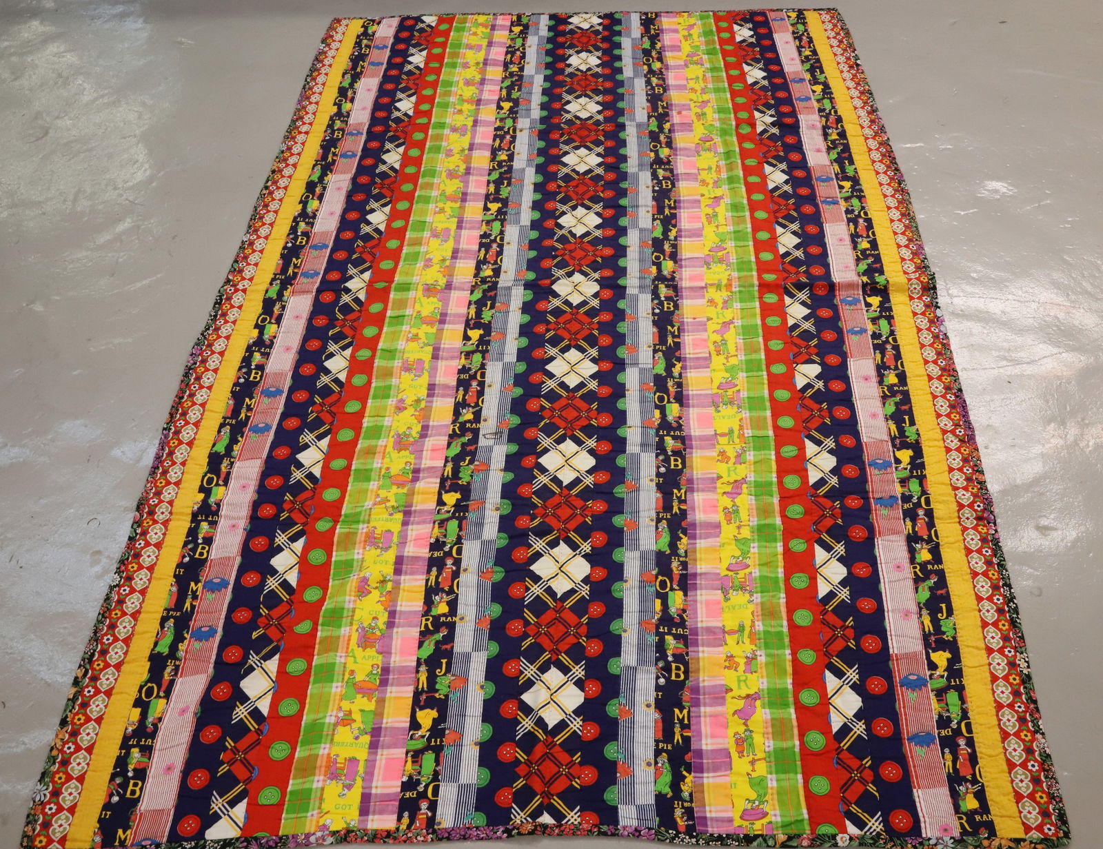 (2) VINTAGE QUILTS: VINTAGE STRIPED FABRIC HAND STITCHED 84" X 54". QUILTED WHITE WITH BIRDS/FLOWERS WITH CENTER HEART. 98" X 75". TERMS: PLEASE READ CAREFULLY - Terms for Purchasing and Shipping of Auction Items. Please