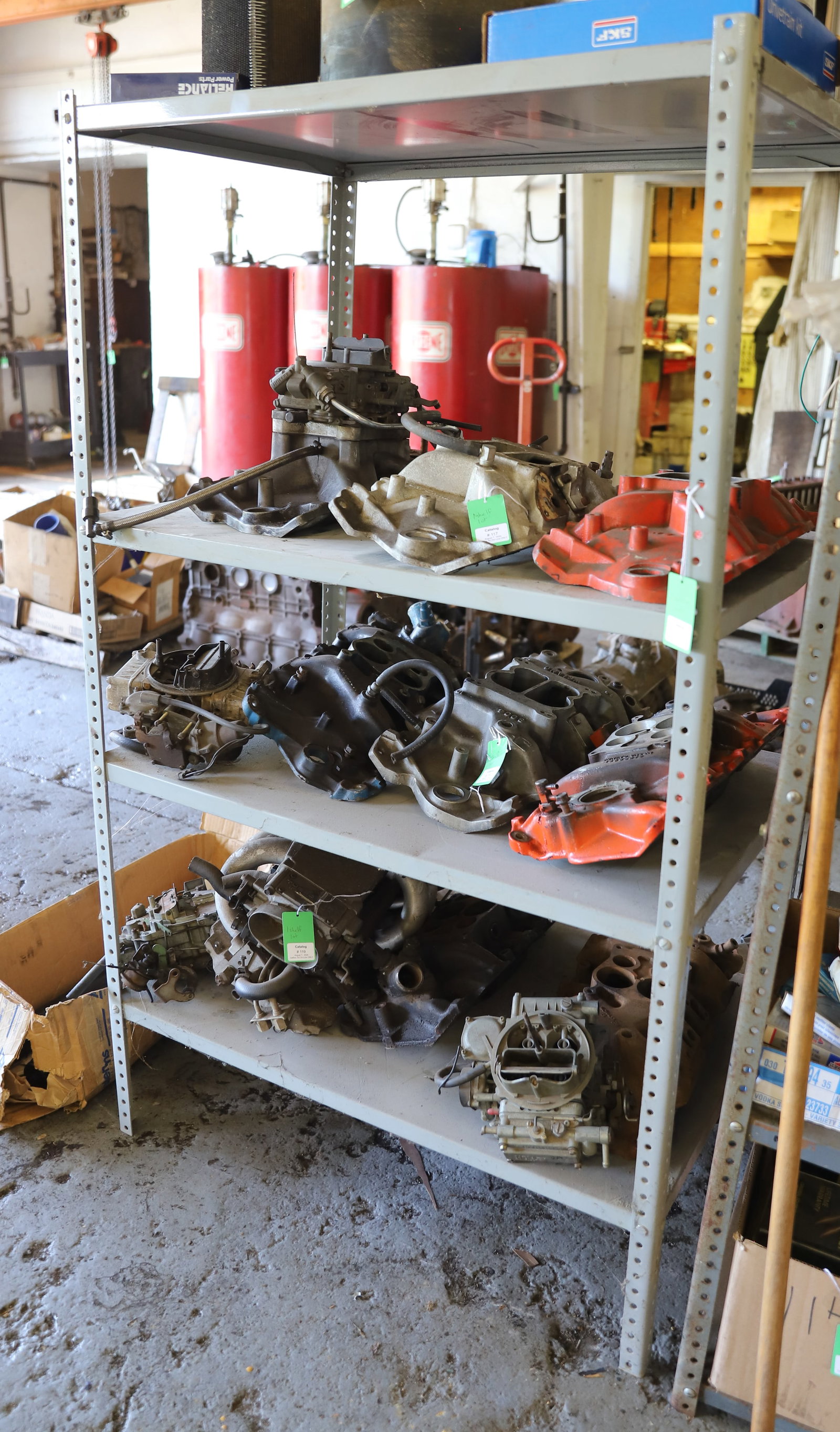 INDUSTRIAL METAL SHELVING: FOUR SHELVES PAINTED GRAY. 62" X 36" X 24". PLEASE READ CAREFULLY - THIS IS AN ONLINE AND ABSENTEE BID ONLY AUCTION. THERE WILL BE A PREVIEW ON SATURDAY AUGUST 17TH FROM 9:00 AM TILL 1:00 PM TO VIEW T