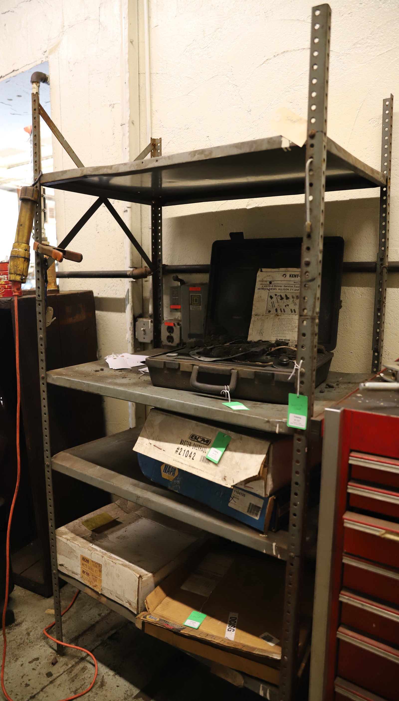 INDUSTRIAL METAL SHELVING: FOUR SHELVES PAINTED GRAY. 75 1/2" X 36" X 24". PLEASE READ CAREFULLY - THIS IS AN ONLINE AND ABSENTEE BID ONLY AUCTION. THERE WILL BE A PREVIEW ON SATURDAY AUGUST 17TH FROM 9:00 AM TILL 1:00 PM TO VI