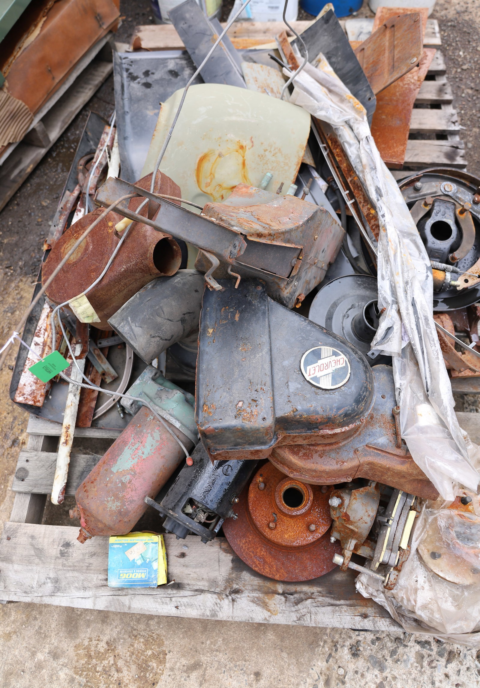 PALLET OF PARTS: METAL PARTS AND CHEVROLET CAR PARTS. PLEASE READ CAREFULLY - THIS IS AN ONLINE AND ABSENTEE BID ONLY AUCTION. THERE WILL BE A PREVIEW ON SATURDAY AUGUST 17TH FROM 9:00 AM TILL 1:00 PM TO VIEW THE AUCT