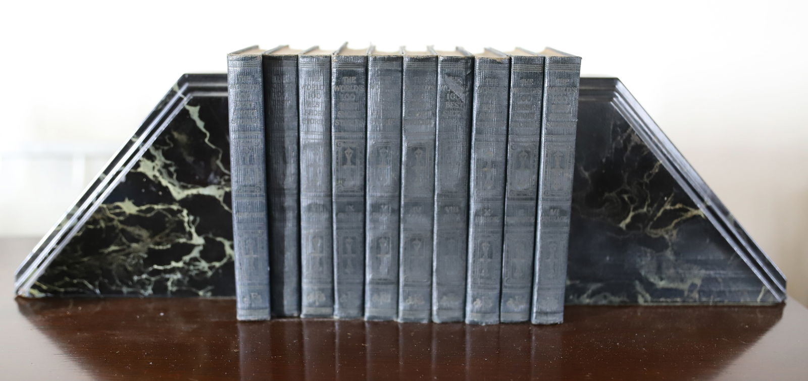 ART DECO BOOKENDS: LOCAL PAINTED SLATE HAND MADE WITH SET OF BOOKS FUNK & WAGNALLS FICTION BOOKEND 6" X 6" X 2" PLEASE READ CAREFULLY – THIS IS AN ONSITE ONLINE ONLY AUCTION. The Address is 206 Market St. Bangor,