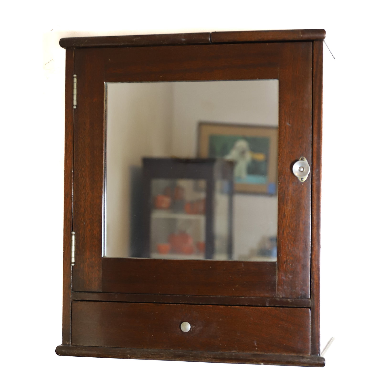 W.D. ALLISON CO. MEDICAL WALL CABINET: MAHOGANY FINISH, MIRROR , DOOR WITH ORIGINAL LABEL, ONE DRAWER HINGED LID SECTION FOR EQUIPMENT, 21" X 18" X 9" VERY GOOD CONDITION PLEASE READ CAREFULLY – THIS IS AN ONSITE ONLINE ONLY AUCTION.