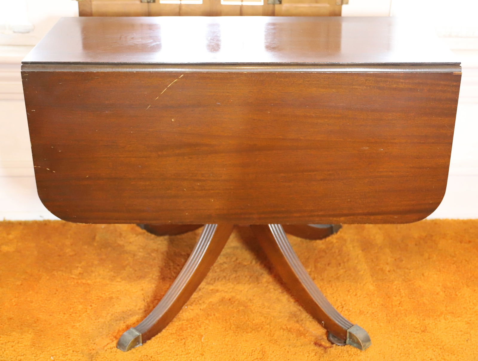 DUNCAN PHYFE STYLE DROP LEAF: WIDE DROP LEAF TABLE WITH SPLAYED LEGS, LONG SINGLE DRAWER 29 1/2" X 40" X 18" EACH LEAF 16"W PLEASE READ CAREFULLY – THIS IS AN ONSITE ONLINE ONLY AUCTION. The Address is 206 Market St. Bangor,