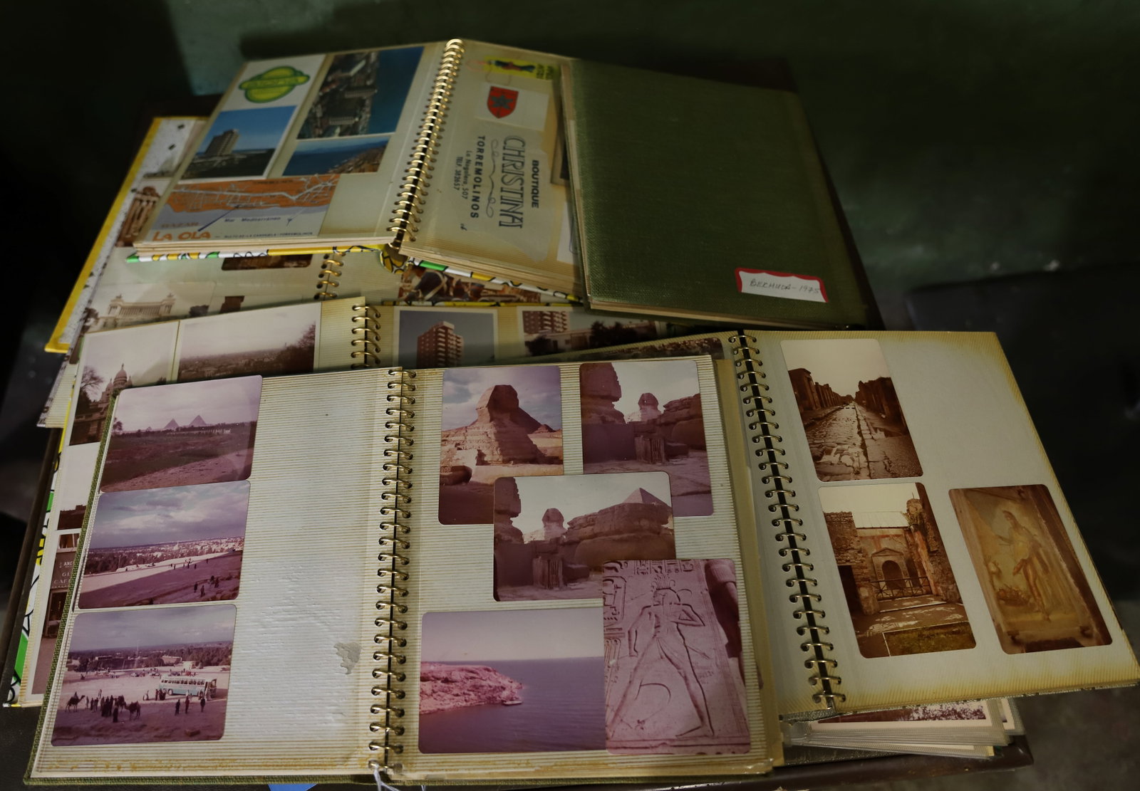 (7) VINTAGE TRAVEL PHOTO ALBUMS: FRANCE,ITALY, EGYPT ETC 1960/70S ALONG WITH CARD TABLE 12" X 10" 34" X 34" PLEASE READ CAREFULLY – THIS IS AN ONSITE ONLINE ONLY AUCTION. The Address is 206 Market St. Bangor, Pa. 18013