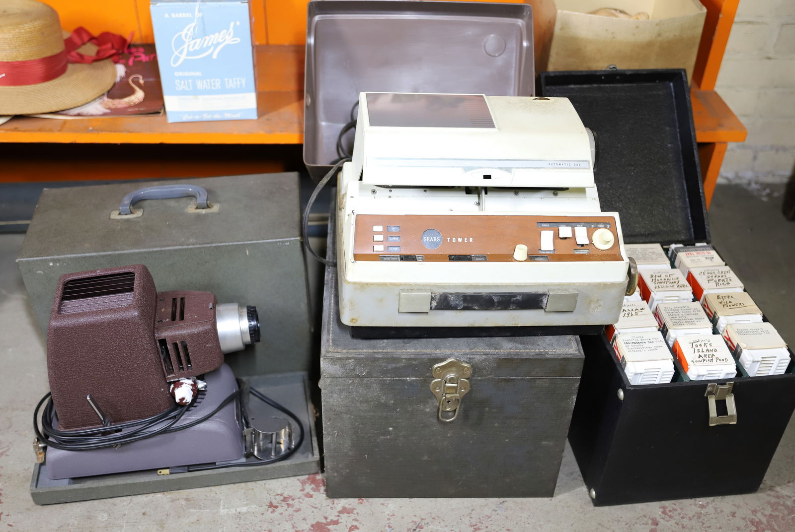 SLIDE PROJECTOR LOT: SLIDE PROJECTOR, SLIDE MAKER, TWO CASES OF TRAVEL SLIDES 36" X 16" PLEASE READ CAREFULLY – THIS IS AN ONSITE ONLINE ONLY AUCTION. The Address is 206 Market St. Bangor, Pa. 18013