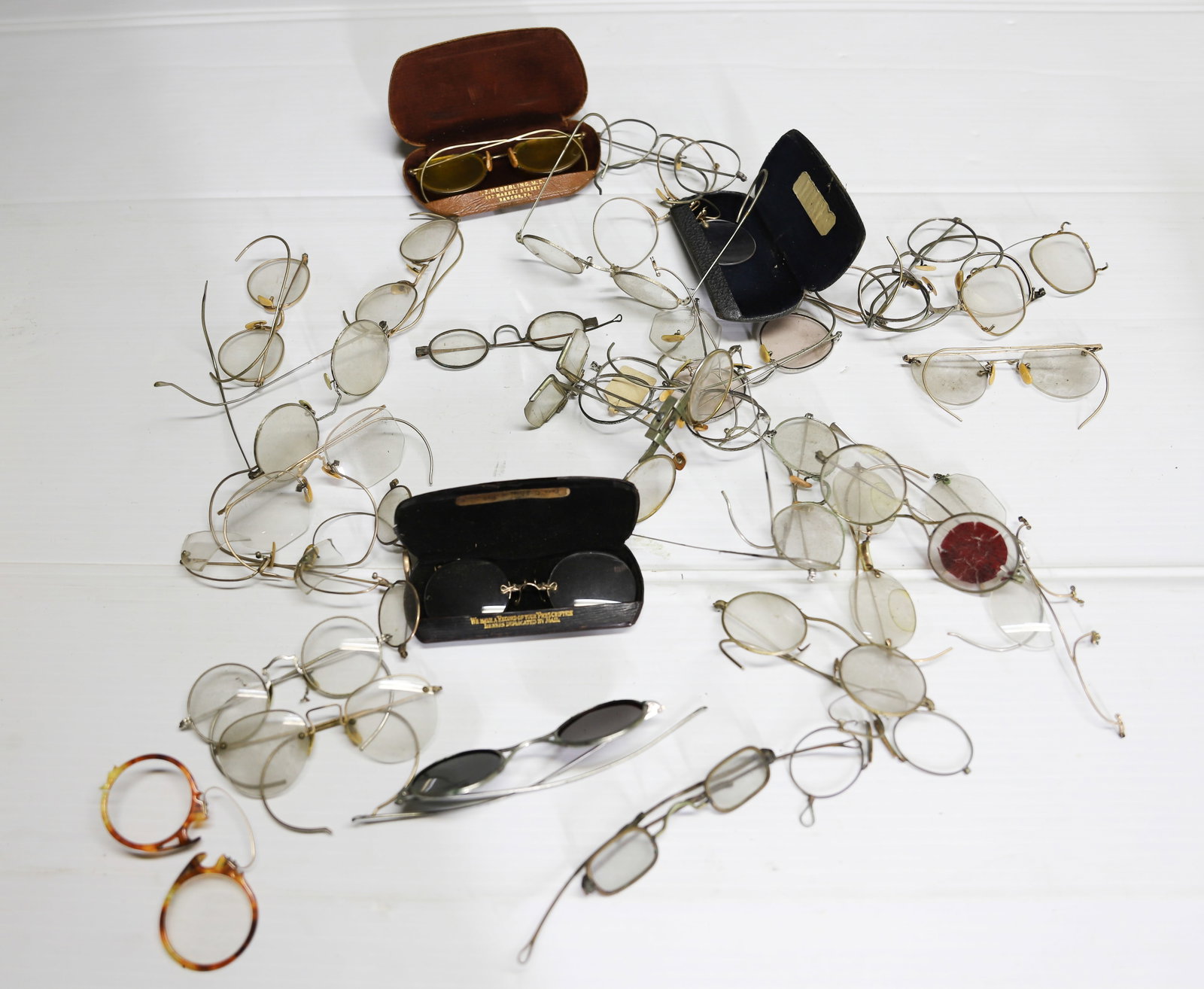 EYEGLASS GROUPING: TWO BOXES OF METAL FRAME EYEGLASS, NICKEL GOLD FILLED METAL ANTIQUE TO 1950S PLEASE READ CAREFULLY – THIS IS AN ONSITE ONLINE ONLY AUCTION. The Address is 206 Market St. Bangor, Pa. 18013