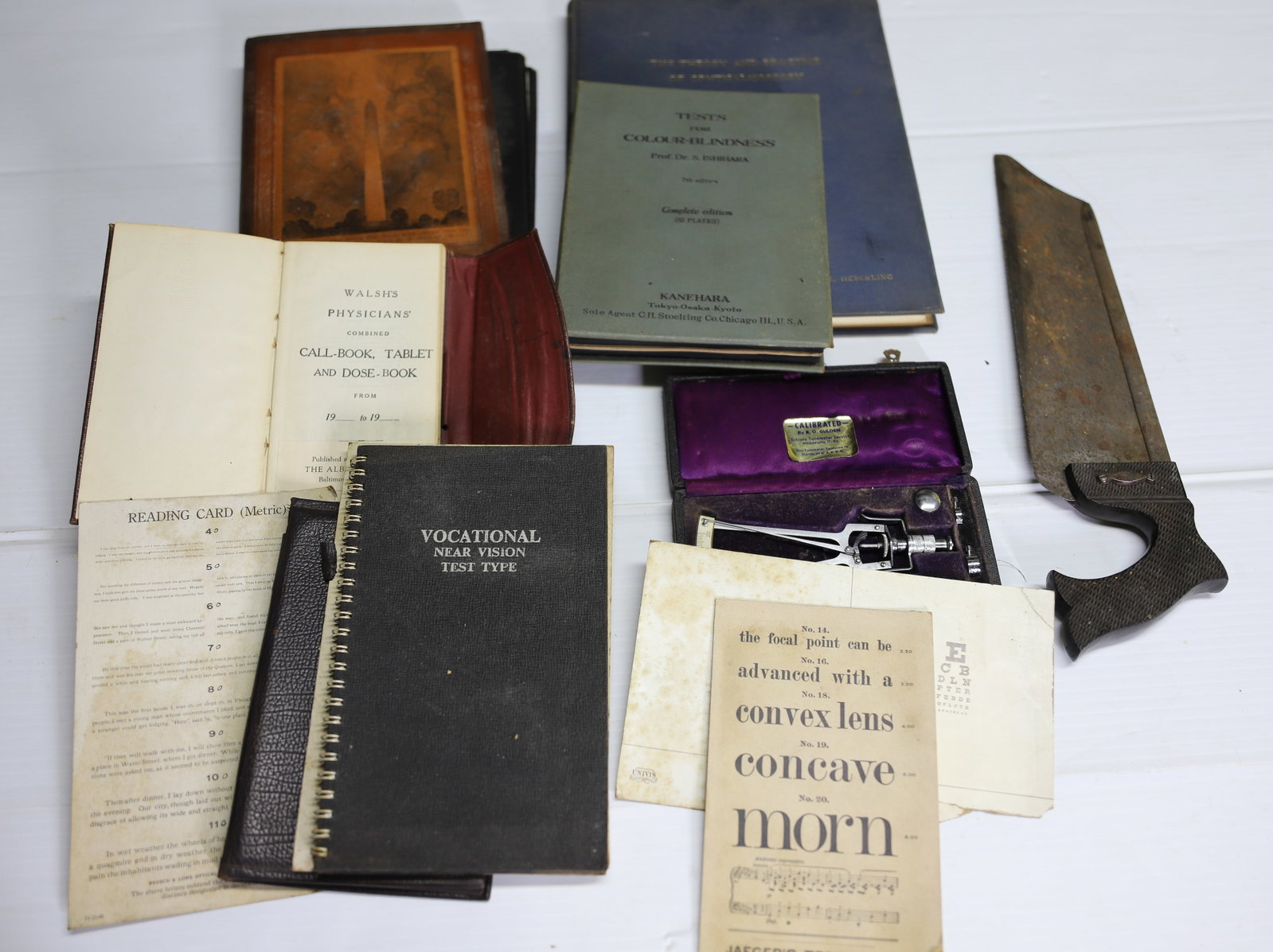 MEDICAL/OPTICAL LOT: SURGERY SAW, PILLING GERMANY EYE MEASURE TOOL, OPTICIAN REFERENCES AND AUDIOMETER IN CASE 17" X 10" PLEASE READ CAREFULLY – THIS IS AN ONSITE ONLINE ONLY AUCTION. The Address is 206 Market St. B