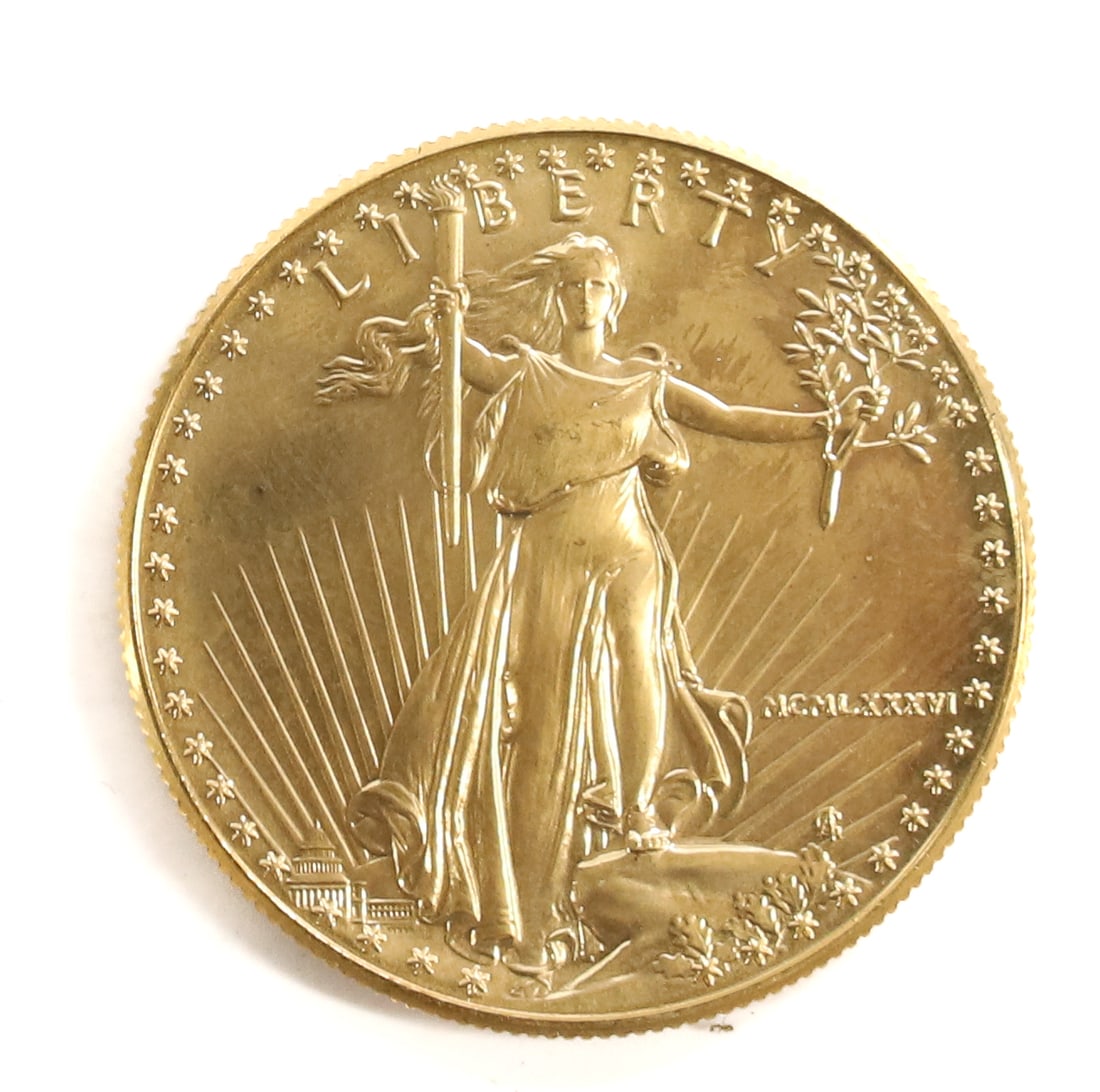 U.S. $50.00 GOLD COIN: 1 OUNCE FINE .999 GOLD - 1986 ( MCMLXXXVI) PLEASE READ CAREFULLY BEFORE BIDDING. ALL PURCHASES OF GOLD OR SILVER VIA LIVE AUCTIONEERS MUST BE PAID FOR THROUGH THE LIVE AUCTIONEERS PAYMENT PROCESSING C