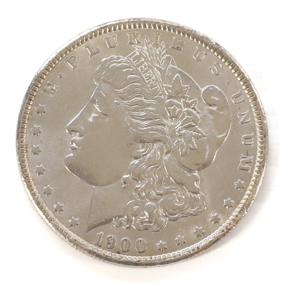 1900 MORGAN DOLLAR: VERY GOOD COIN PLEASE READ CAREFULLY BEFORE BIDDING. ALL PURCHASES OF GOLD OR SILVER VIA LIVE AUCTIONEERS MUST BE PAID FOR THROUGH THE LIVE AUCTIONEERS PAYMENT PROCESSING CENTER. NO IN-HOUSE CREDIT CA