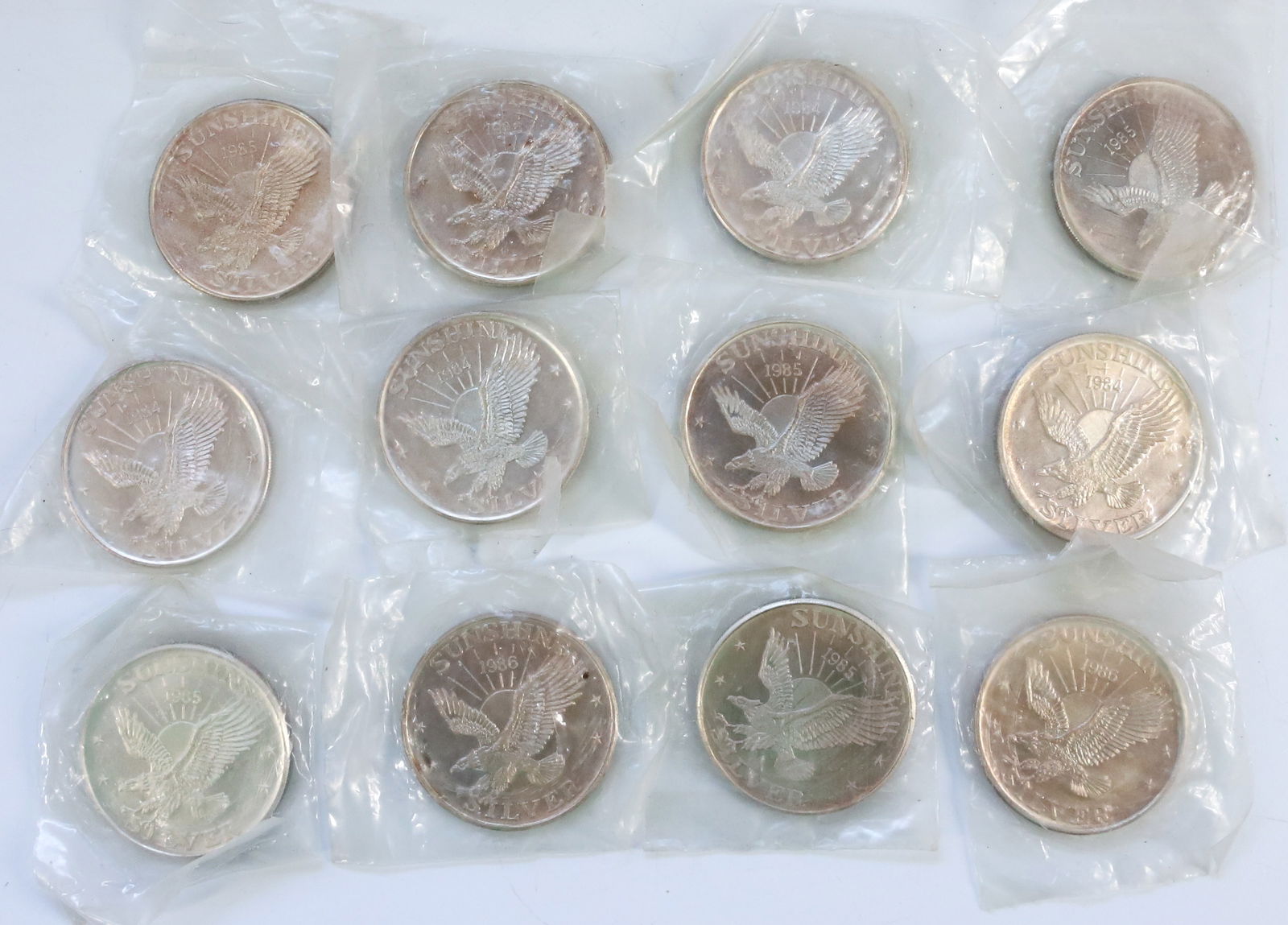 (12) SUNSHINE MINING 1 OZ .999 FINE COINS (1 of 4)