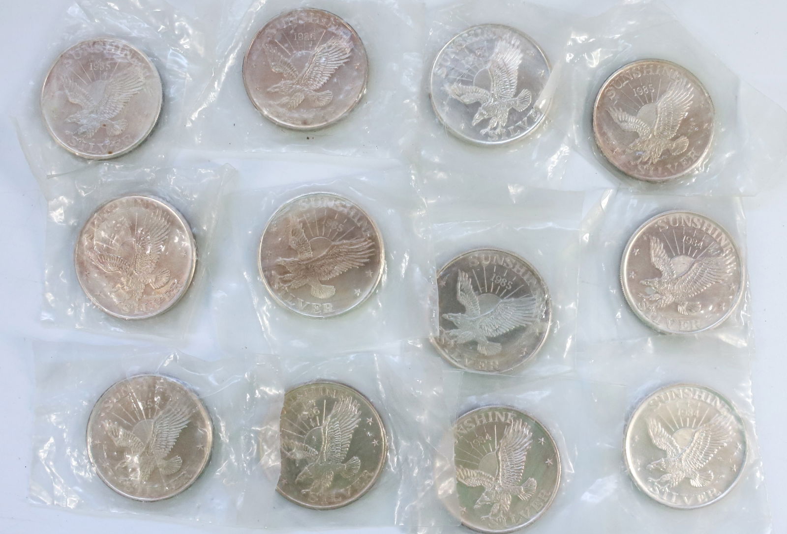 (12) SUNSHINE MINING 1 OZ .999 FINE COINS (1 of 4)