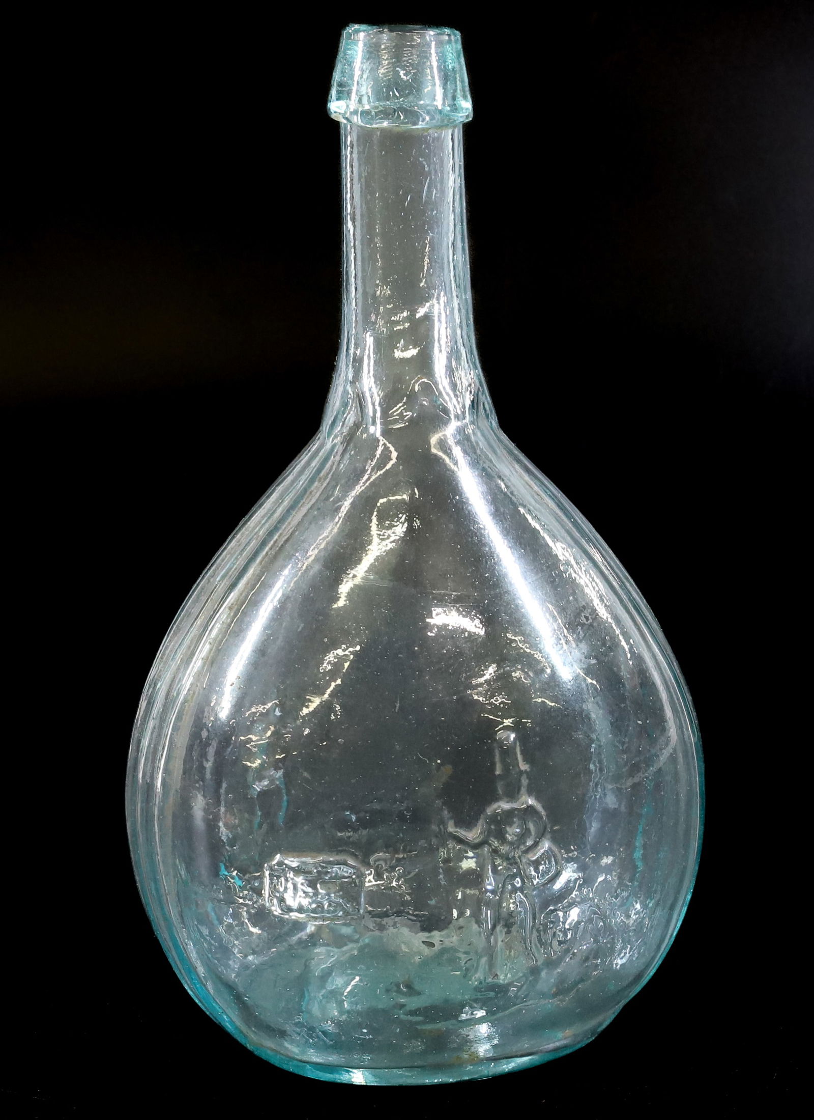 CALABASH FLASK, HUNTER/FISHERMAN: LIGHT AQUA. BLOWN IN MOLD. HUNTER FIRING GUN ON ONE SIDE AND FISHERMAN WITH FISH IN HAND ON OTHER. 9" H. PLEASE READ CAREFULLY - Terms for Purchasing and Shipping of Auction Items. Please read careful