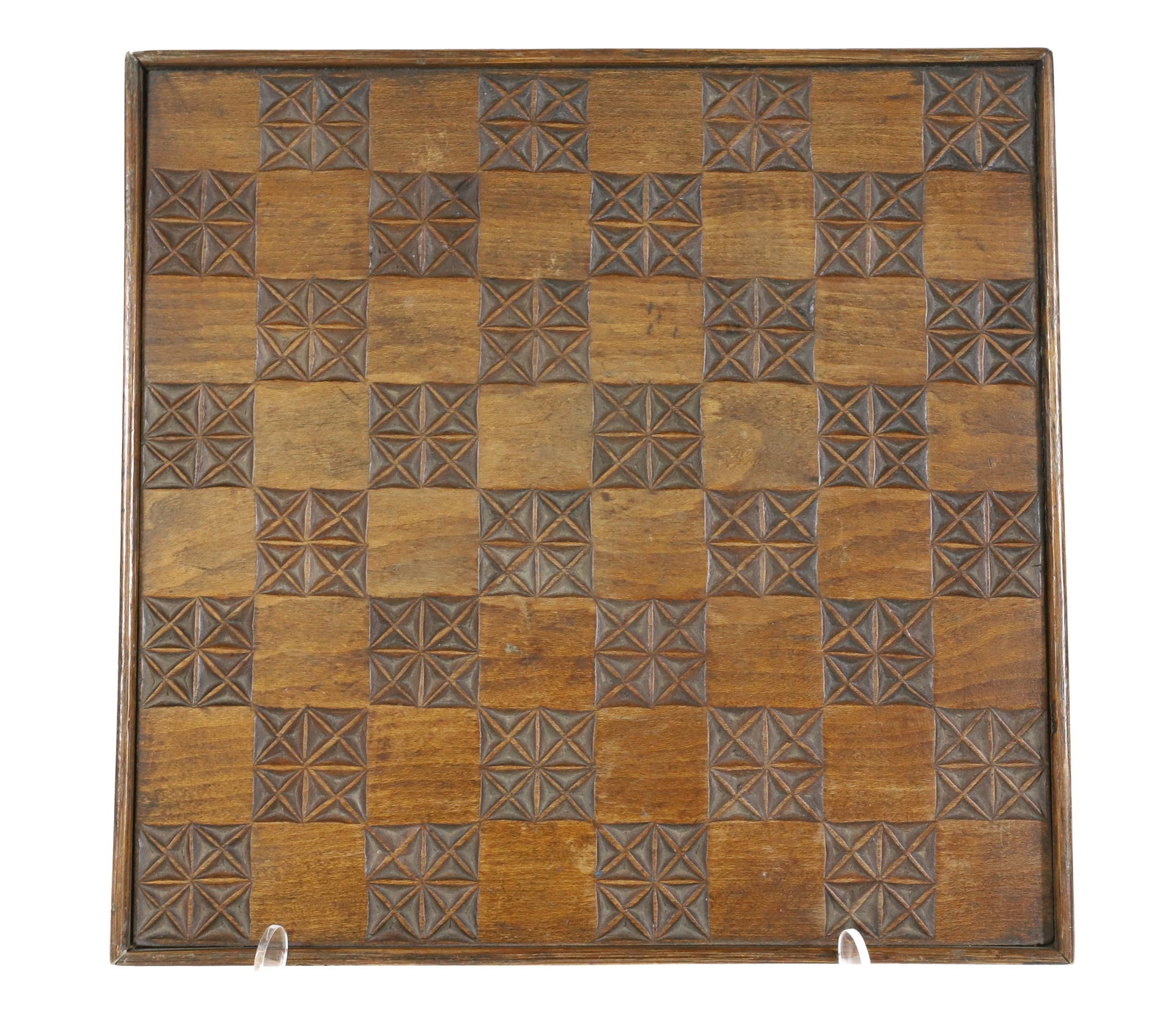 ANTIQUE CARVED GAMEBOARD: UNUSUAL GOUGED DECORATION OF ALTERNATING SQUARES. IMPRESSED NAMES ON BACK. 12" X 12 3/8". PLEASE READ CAREFULLY - Terms for Purchasing and Shipping of Auction Items. Please read carefully before biddi