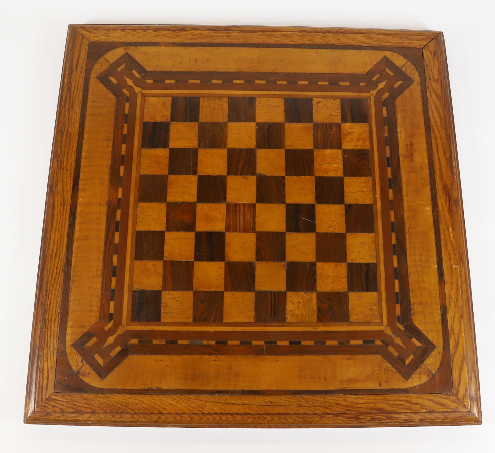 INLAID CHESS / CHECKERBOARD: VARIOUS WOOD USED IN BOARD. 22" X 22". PLEASE READ CAREFULLY - Terms for Purchasing and Shipping of Auction Items. Please read carefully before bidding. All payments for purchases will be made through