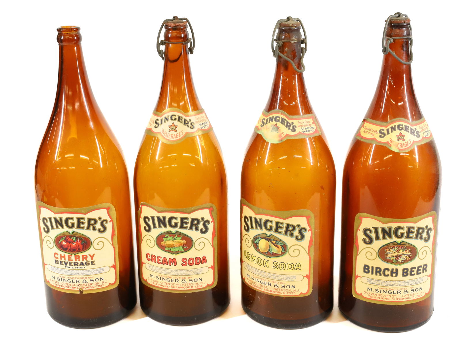LOT OF M. SINGER BEVERAGE BOTTLES (1 of 4)