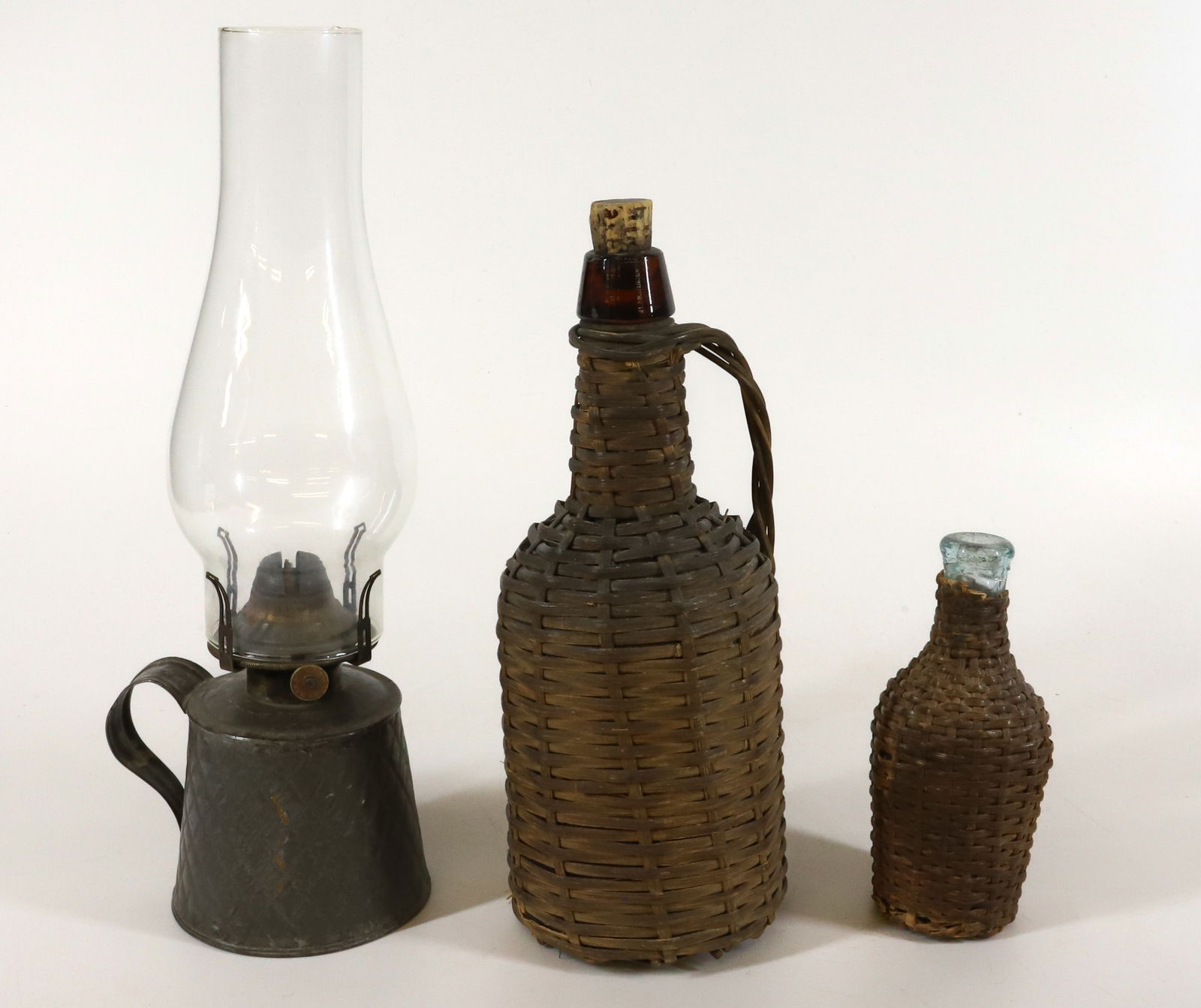 TIN KEROSENE LAMP AND (2) WICKER BOTTLES (1 of 3)