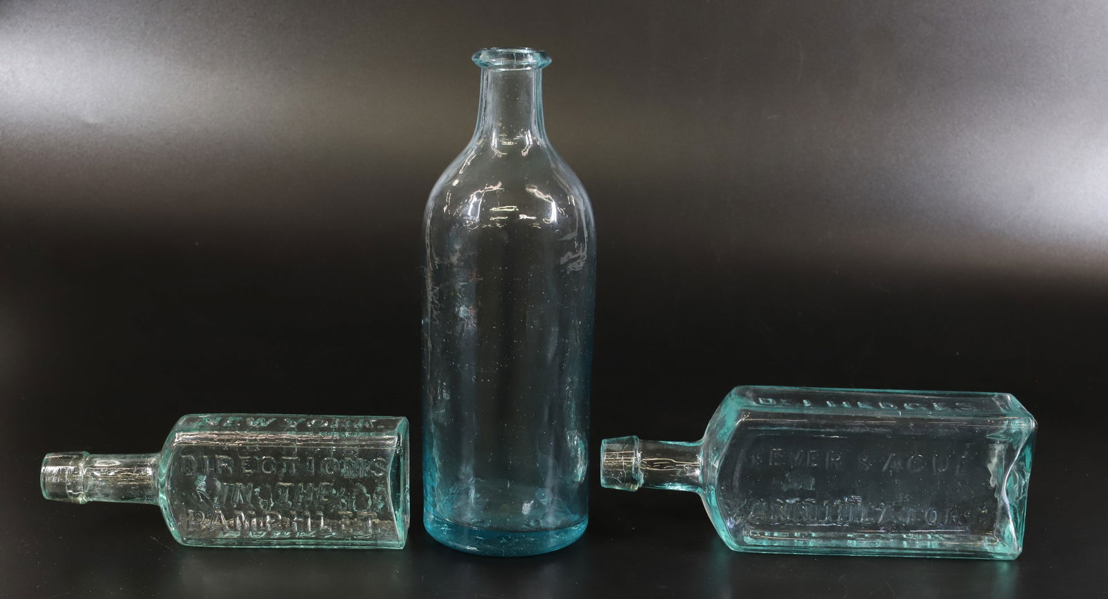 LOT OF (3) ANTIQUE BOTTLES IN AQUA (1 of 7)