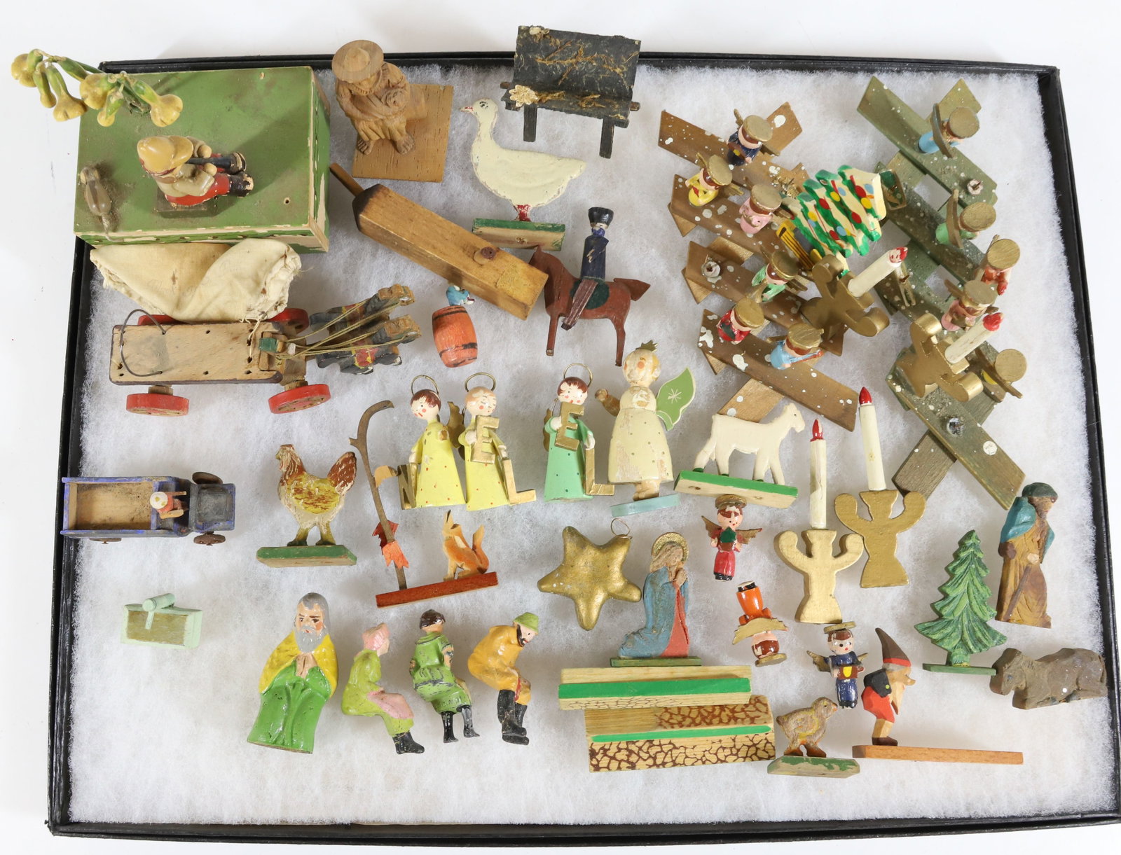 LOT OF CARVED WOODEN CHRISTMAS FIGURES: CARVED AND PAINTED PEOPLE, TREES, "SCISSOR" TOYS AND MORE. SOME MRKD. GERMANY. PLEASE READ CAREFULLY - Terms for Purchasing and Shipping of Auction Items. Please read carefully before bidding. All pay