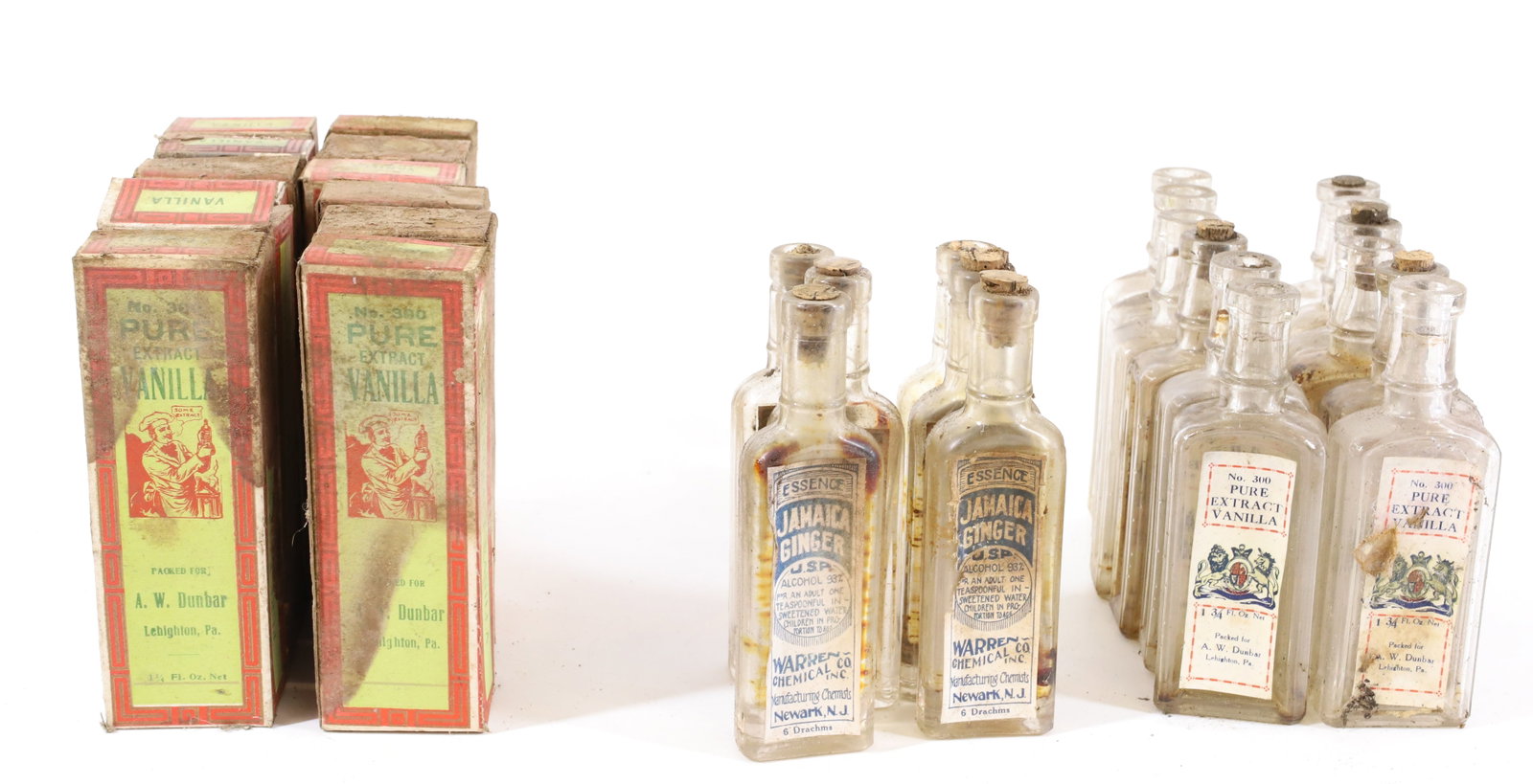 LOT OF ANTIQUE BOTTLES WITH LABELS/BOXES: PURE VANILLA EXTRACT (A.W. DUNBAR, LEHIGHTON) SOME WITH ORIGINAL BOXES. ALSO, JAMAICA GINGER (WARREN CHEMICAL, NEWARK,NJ) 5 1/2" H. PLEASE READ CAREFULLY - Terms for Purchasing and Shipping of Auction