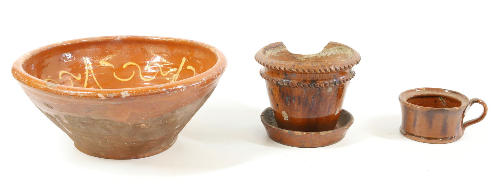 LOT OF ANTIQUE REDWARE: INCLUDING: SLIP DECORATED BOWL 4 1/2" X 10 1/2", CRIMPED EDGE FLOWERPOT 4 1/2" H. AND MUSTARD POT WITH HANDLE (NO LID). PLEASE READ CAREFULLY - Terms for Purchasing and Shipping of Auction Items. Plea