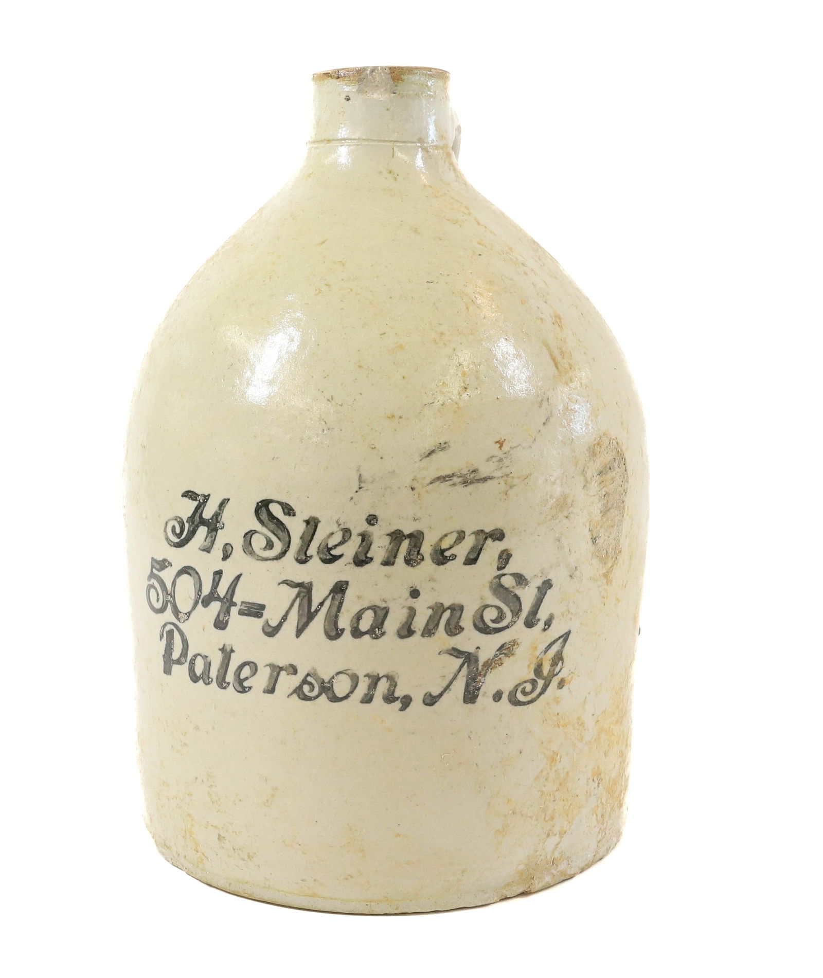 PATERSON, NJ STAMPED ADVERTISING JUG: H. STEINER, 504-MAIN ST.. 10 3/4" H. PLEASE READ CAREFULLY - Terms for Purchasing and Shipping of Auction Items. Please read carefully before bidding. All payments for purchases will be made through L