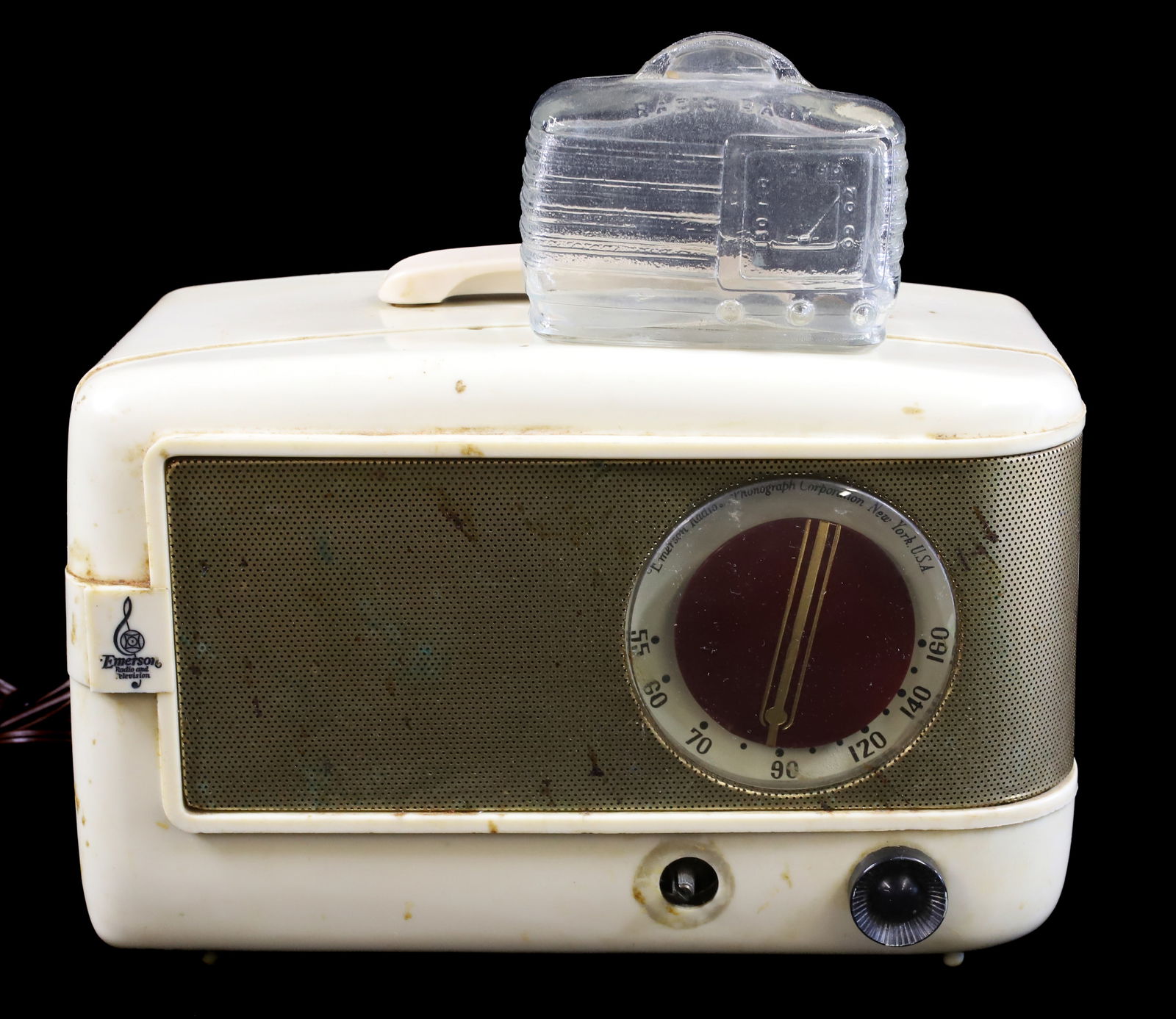 VINTAGE EMERSON RADIO AND BANK: EMERSON MODEL 543 AND EMBOSSED CLEAR RADIO SHAPED BANK 4" L. PLEASE READ CAREFULLY - Terms for Purchasing and Shipping of Auction Items. Please read carefully before bidding. All payments for purchase